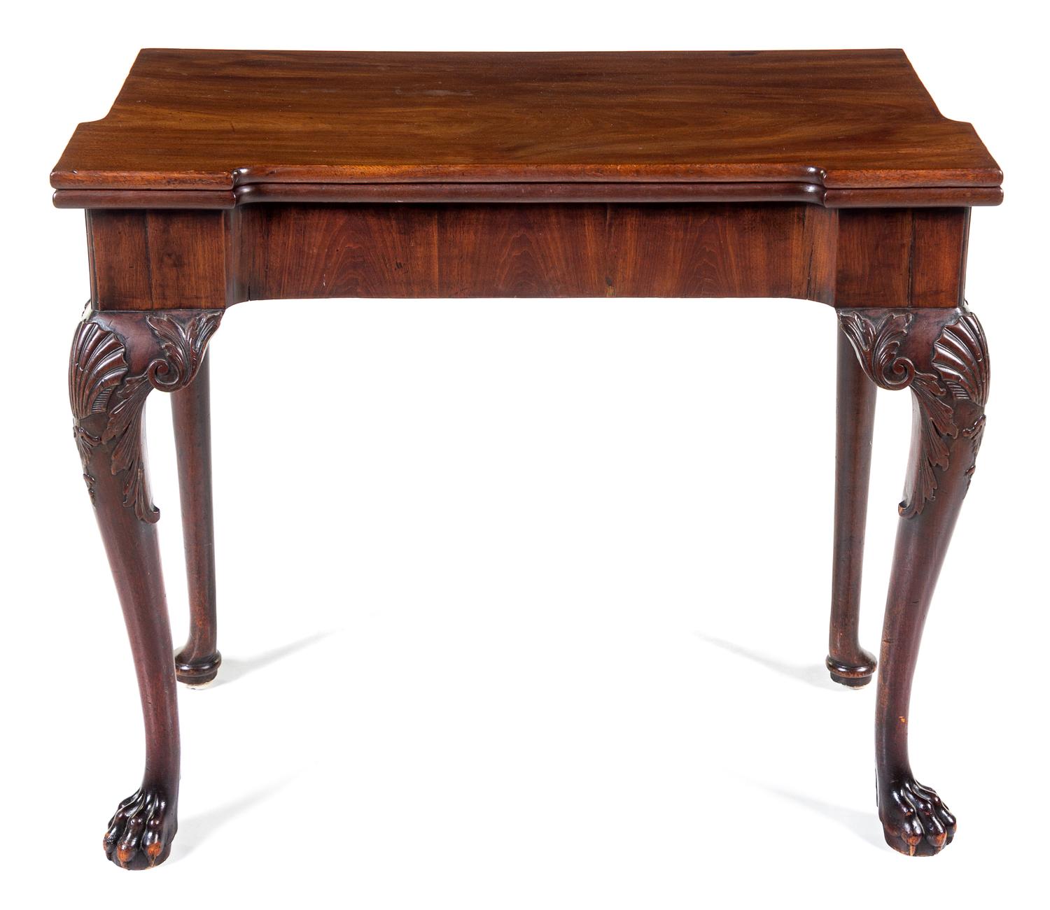 A George III Mahogany Concertina-Action Flip-Top Game Table Height 28 x width 32 1/2 x depth 16 1/2 inches (closed). — PROBABLY IRISH, 18TH/19TH CENTURY