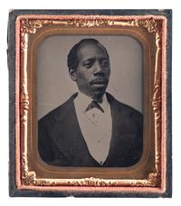[EARLY PHOTOGRAPHY]. A group of 2 sixth plate tintypes of handsome African American gentlemen, comprising: