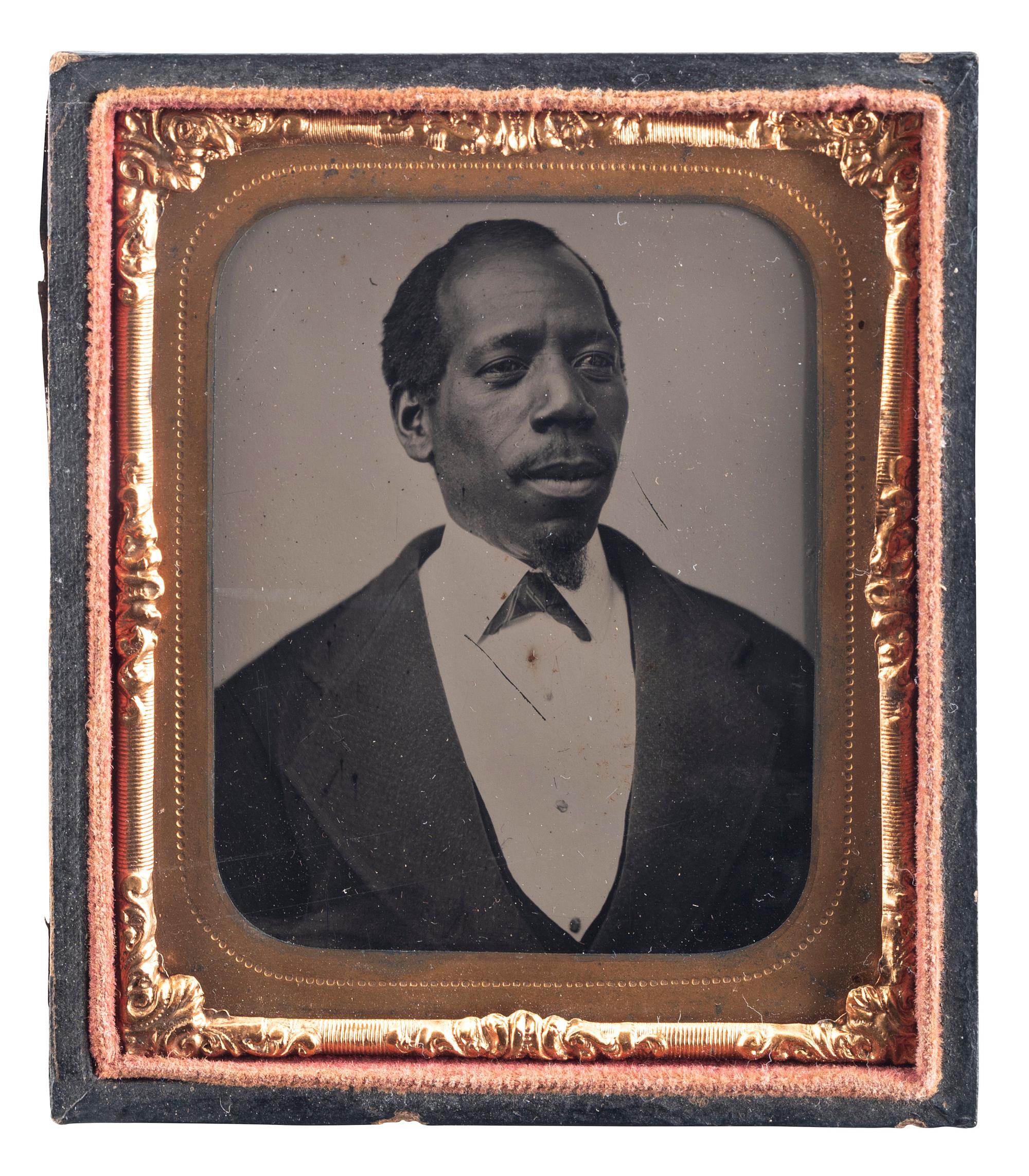 [EARLY PHOTOGRAPHY]. A group of 2 sixth plate tintypes of handsome African American gentlemen, comprising: