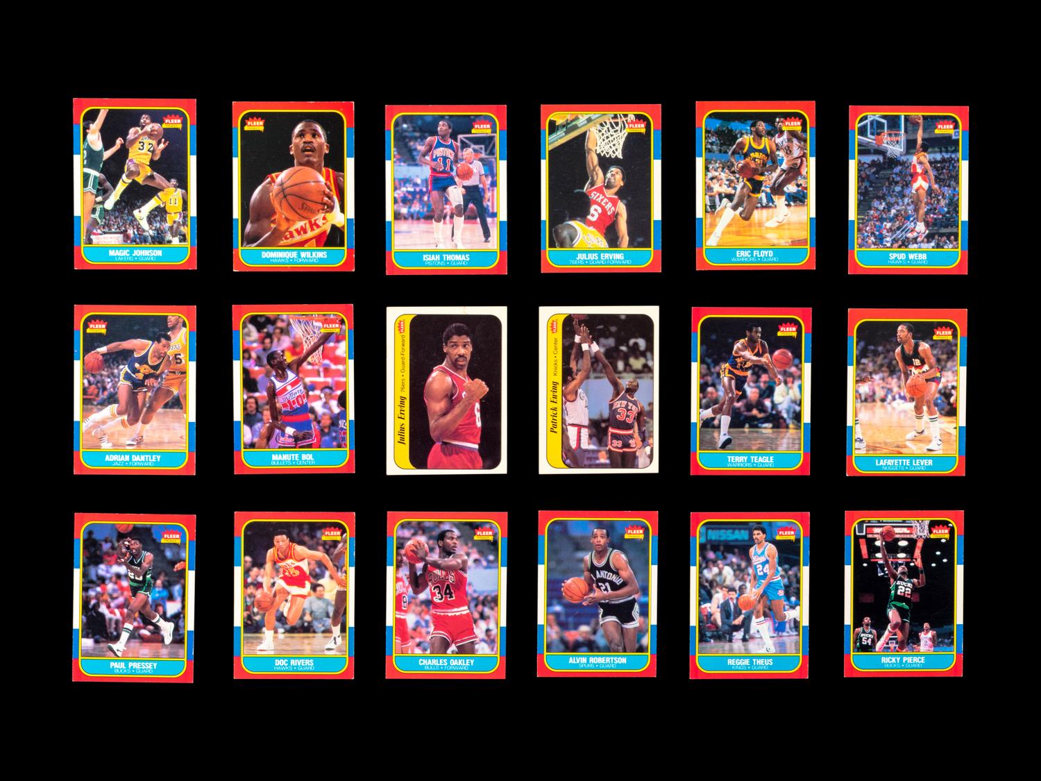 A Group of 71 1986 Fleer Basketball Cards and Stickers (Including Julius Erving, Patrick Ewing, Magic Johnson and Hakeem Olajuwon)