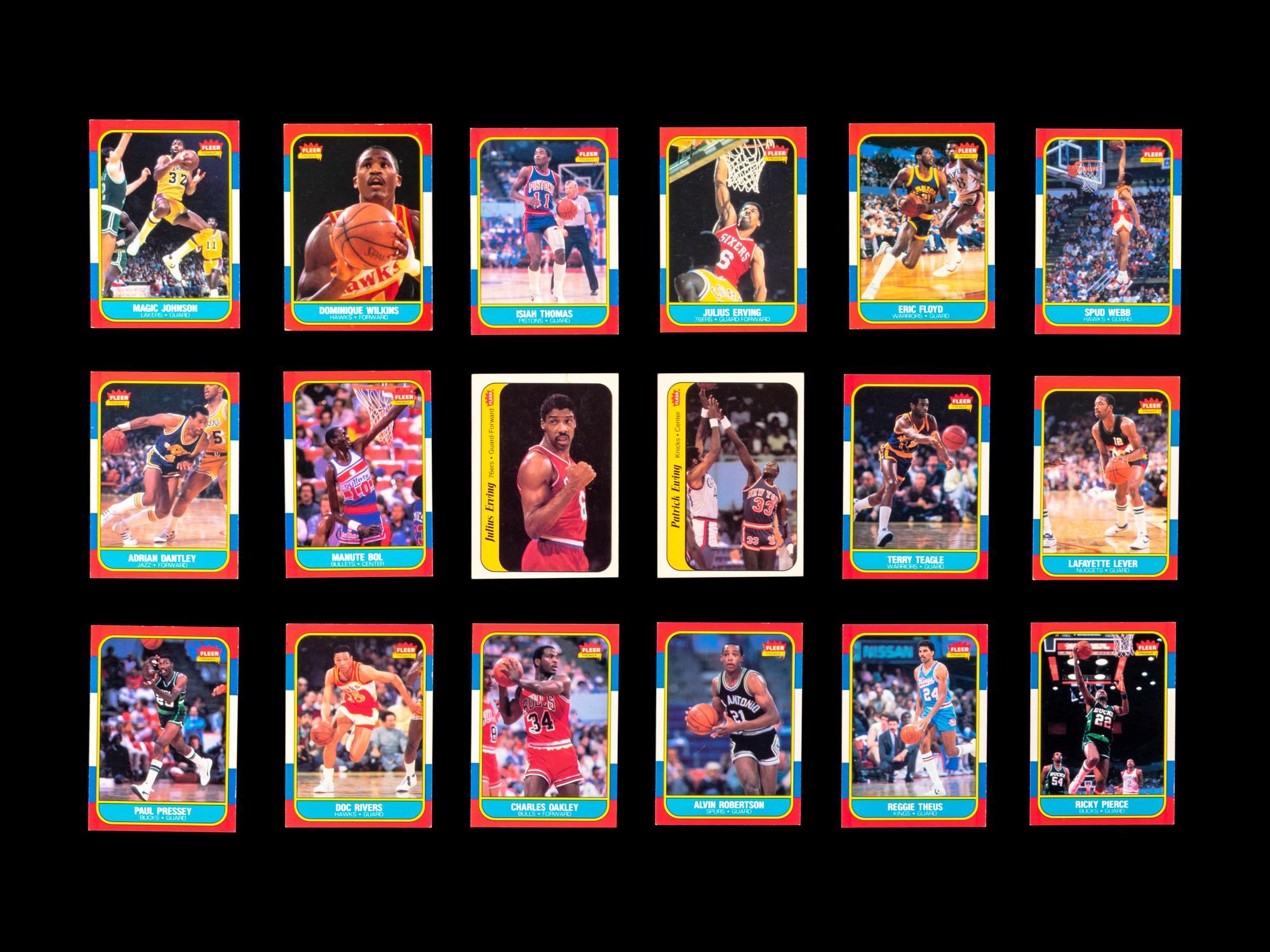 A Group of 71 1986 Fleer Basketball Cards and Stickers (Including Julius Erving, Patrick Ewing, Magic Johnson and Hakeem Olajuwon)