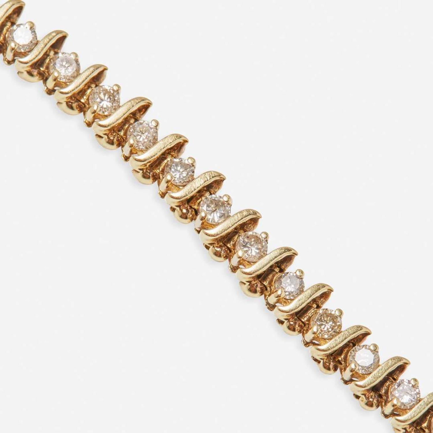A 14K Yellow Gold and Diamond Bracelet