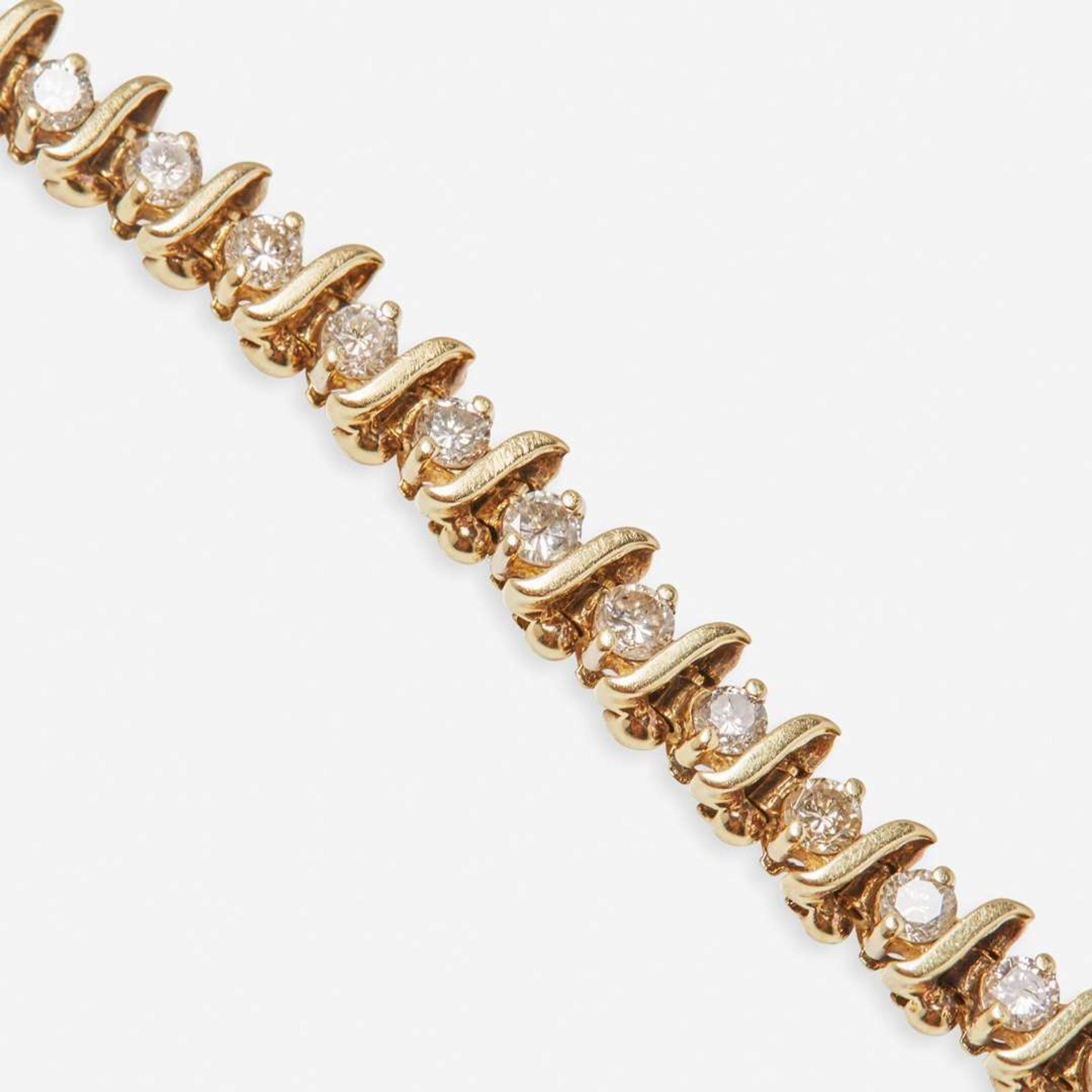 A 14K Yellow Gold and Diamond Bracelet