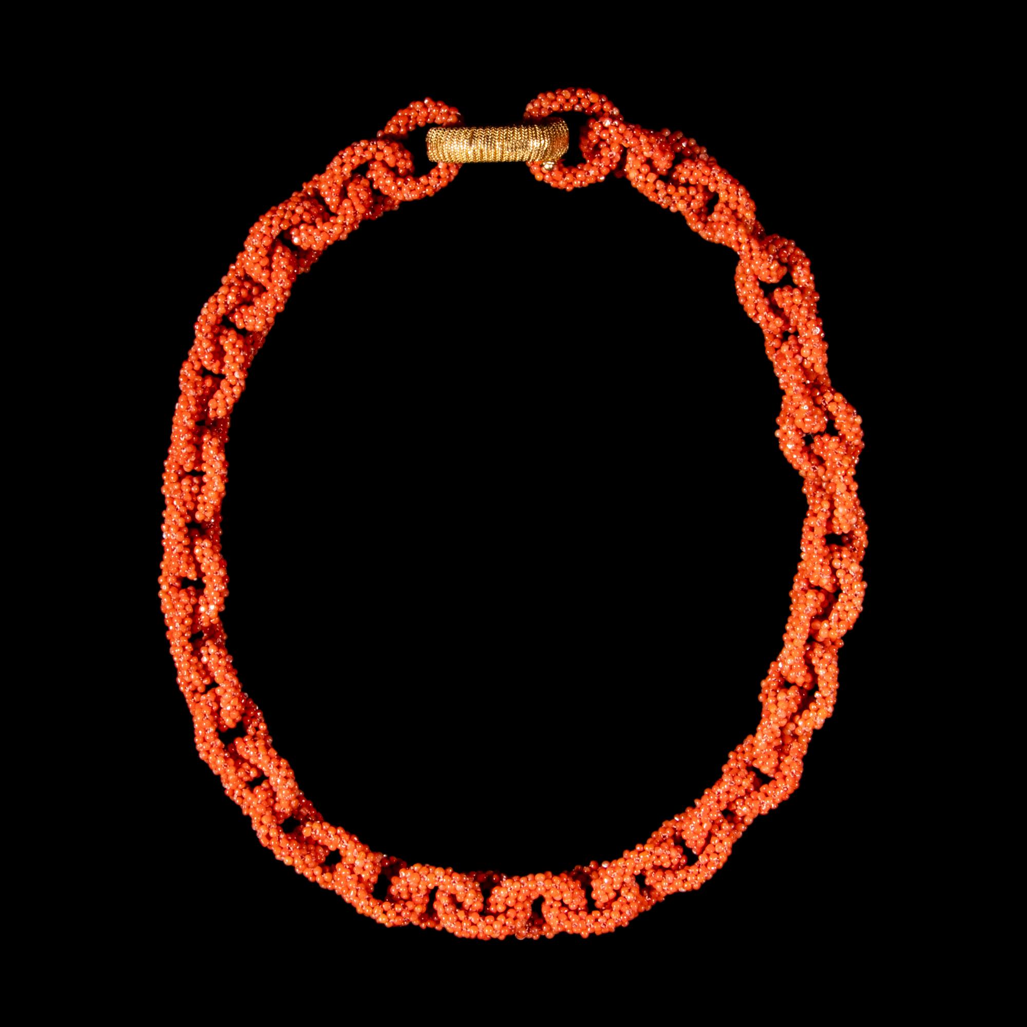 A Chinese Coral Bead 'Loop' Necklace, 20th Century