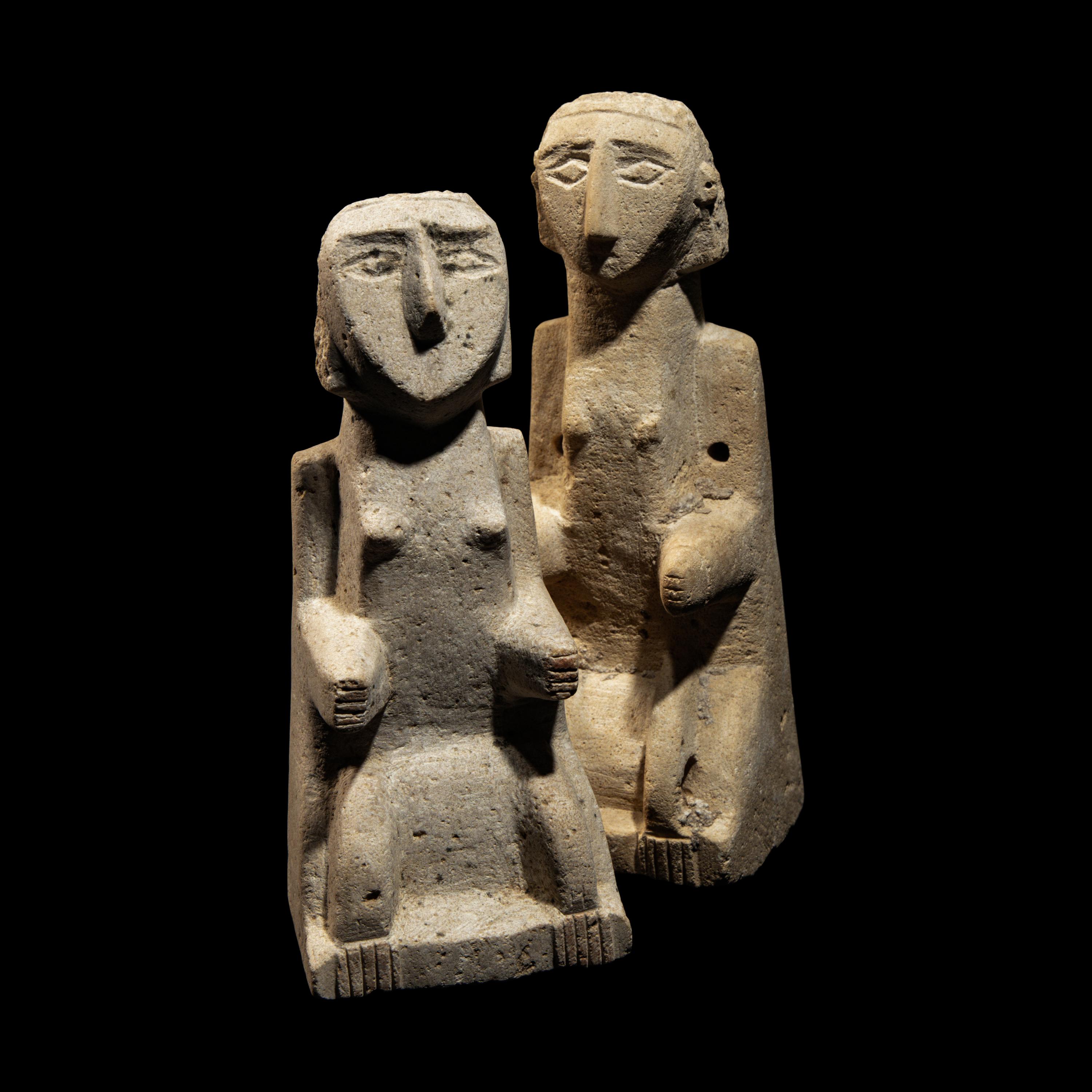 A Pair of South Arabian Limestone Seated Figures