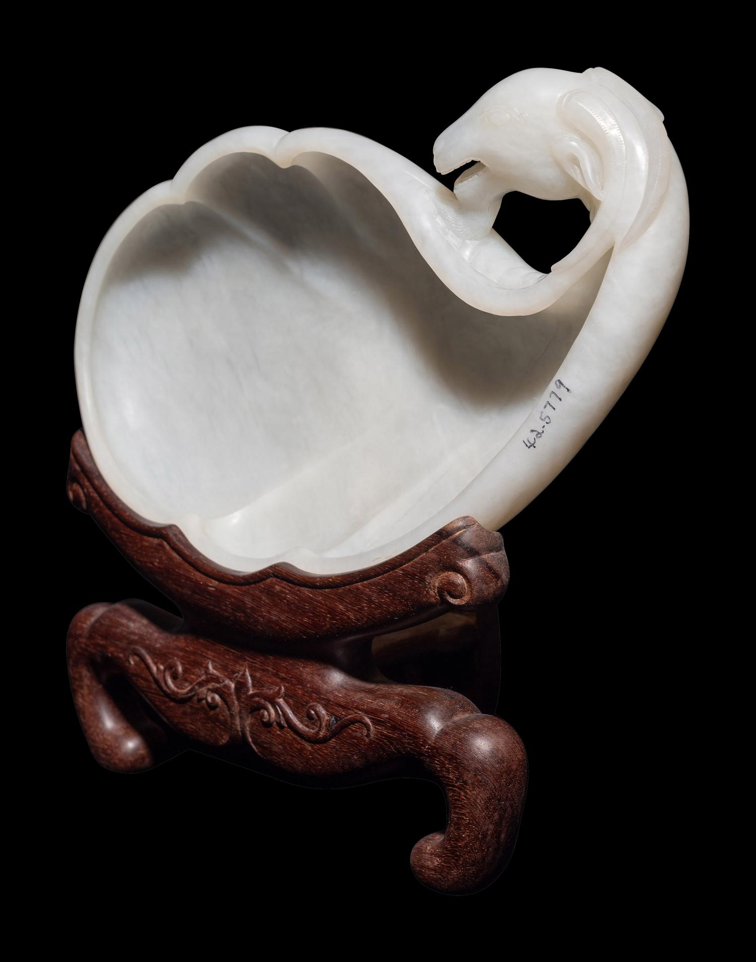A Chinese White Jade 'Ram's Head' Dish