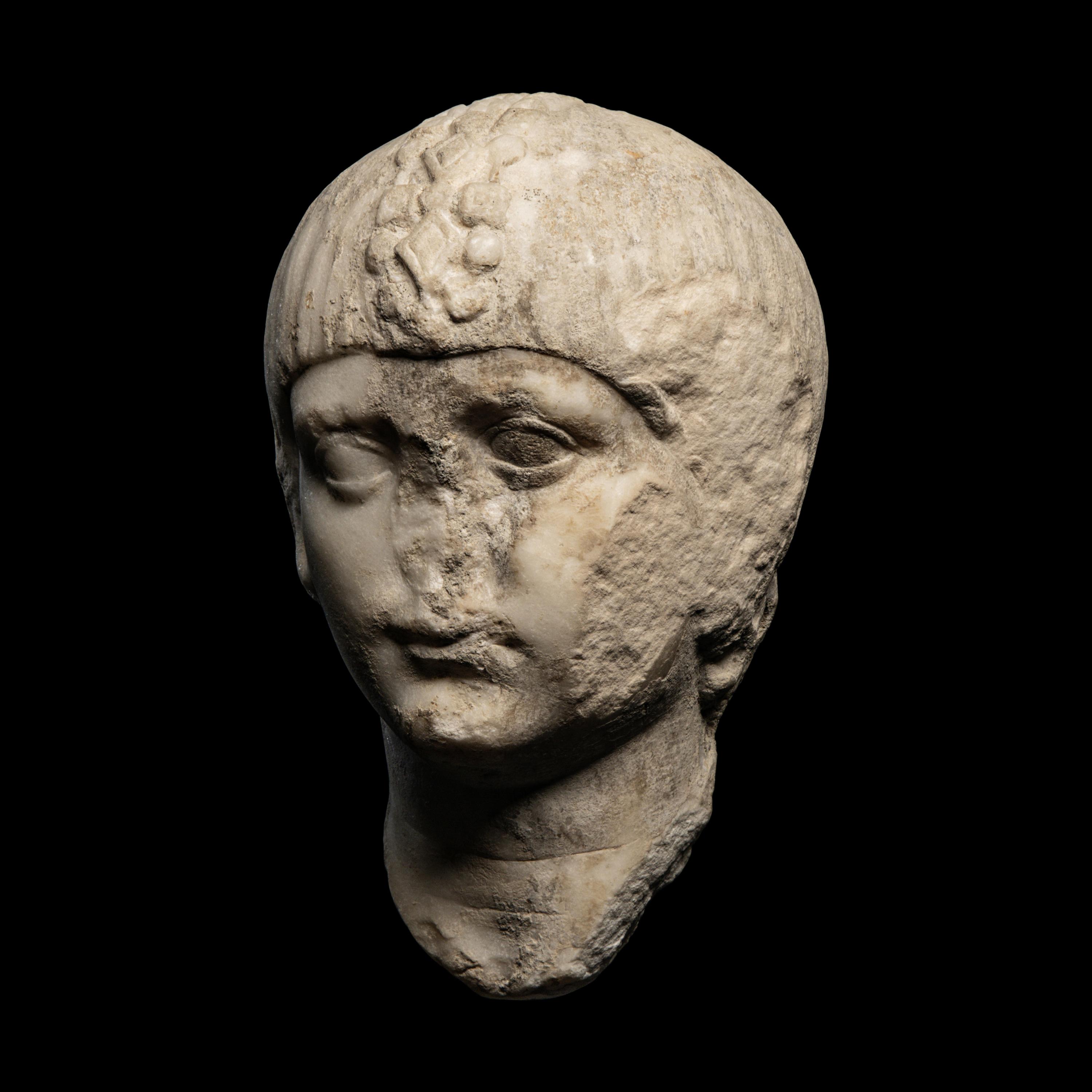 A Roman Marble Portrait Head of a Boy
