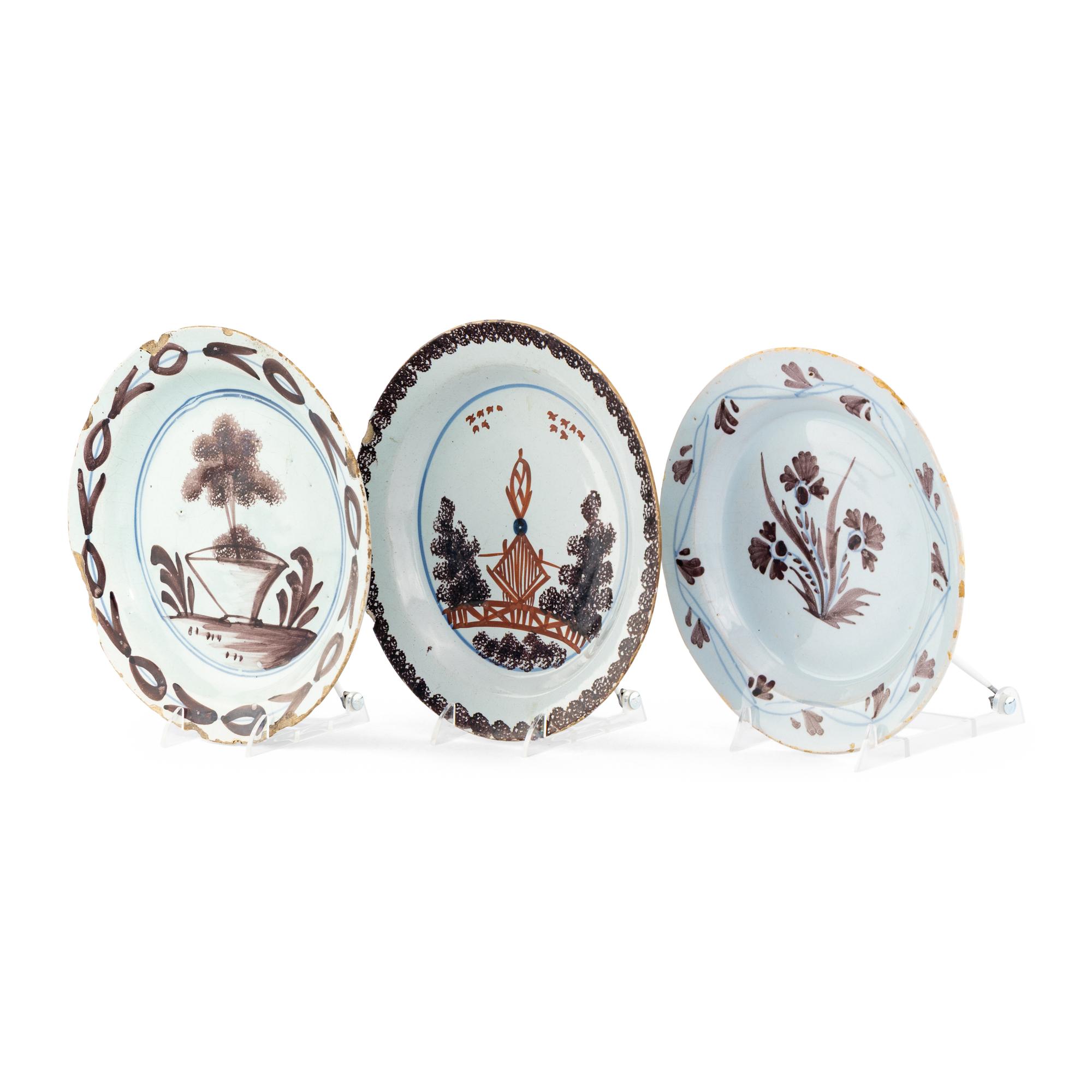 A Collection of Three English Manganese Decorated Delftware Plates