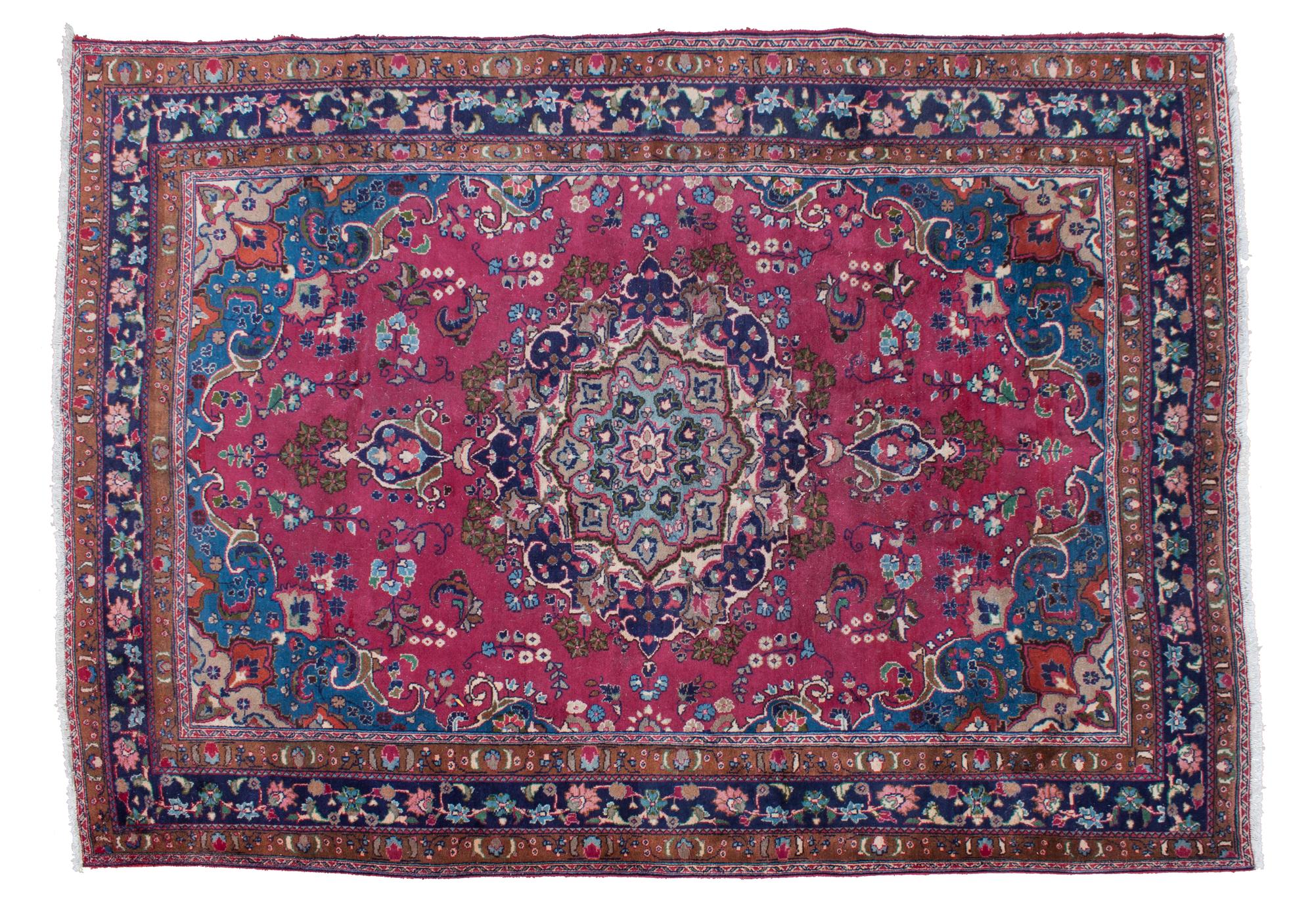 An Oriental Wool Rug 10 feet 10 1/2 inches x 8 feet.