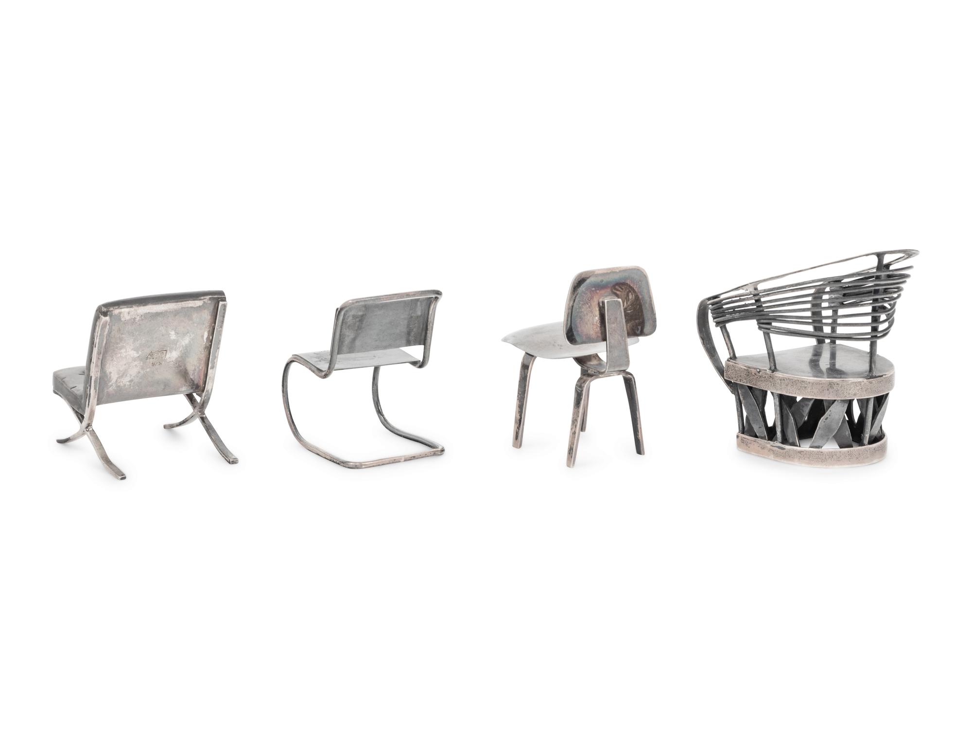 A Set of Three Silver Miniature Modernist Chairs