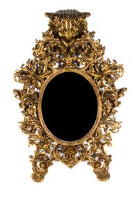 An Italian Rococo Giltwood Pier Mirror, Height 57 x width 38 inches.