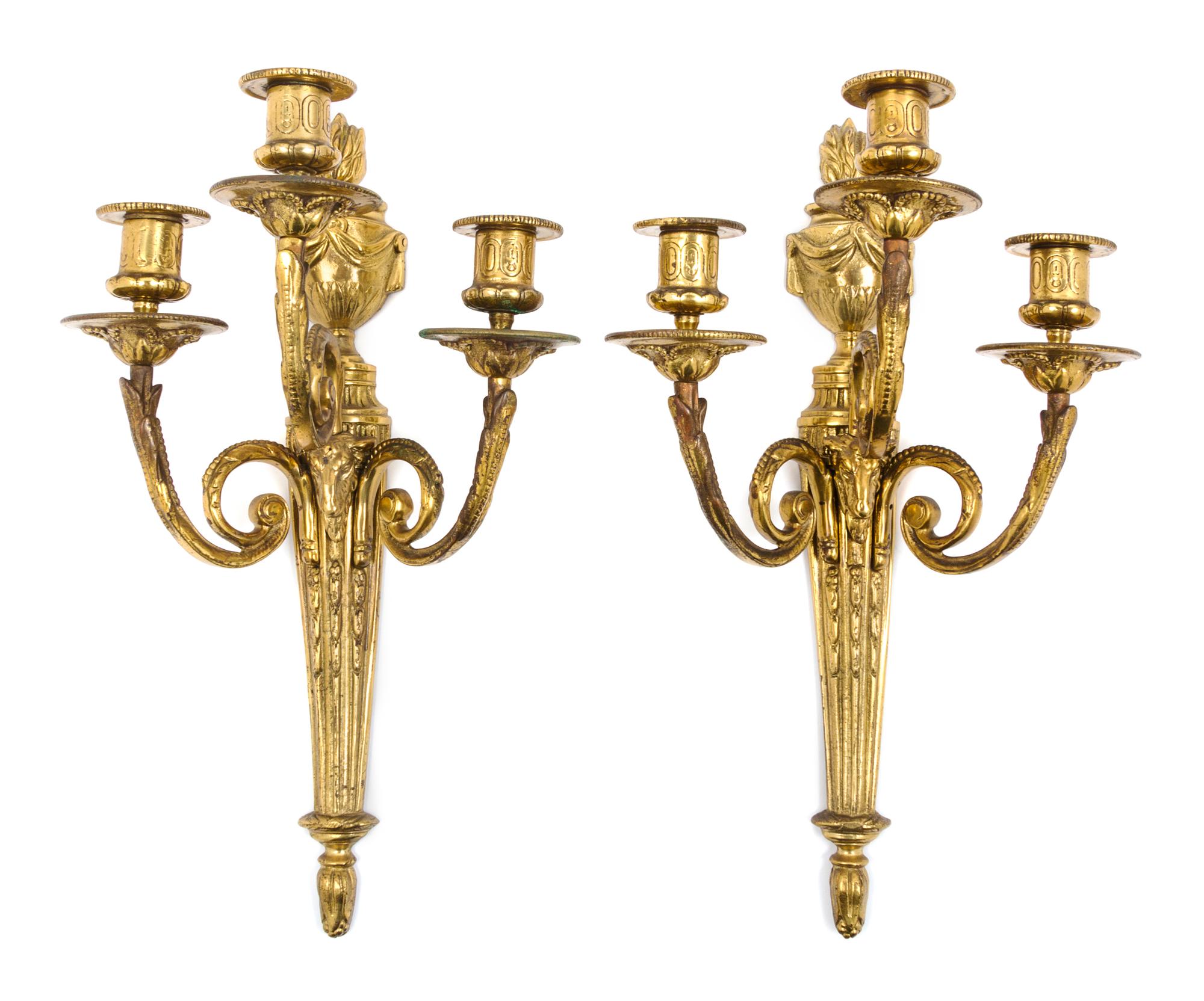 A Pair of Neoclassical Style Gilt Metal Three-Light Sconces Height 16 1/2 inches. — EARLY 20TH CENTURY