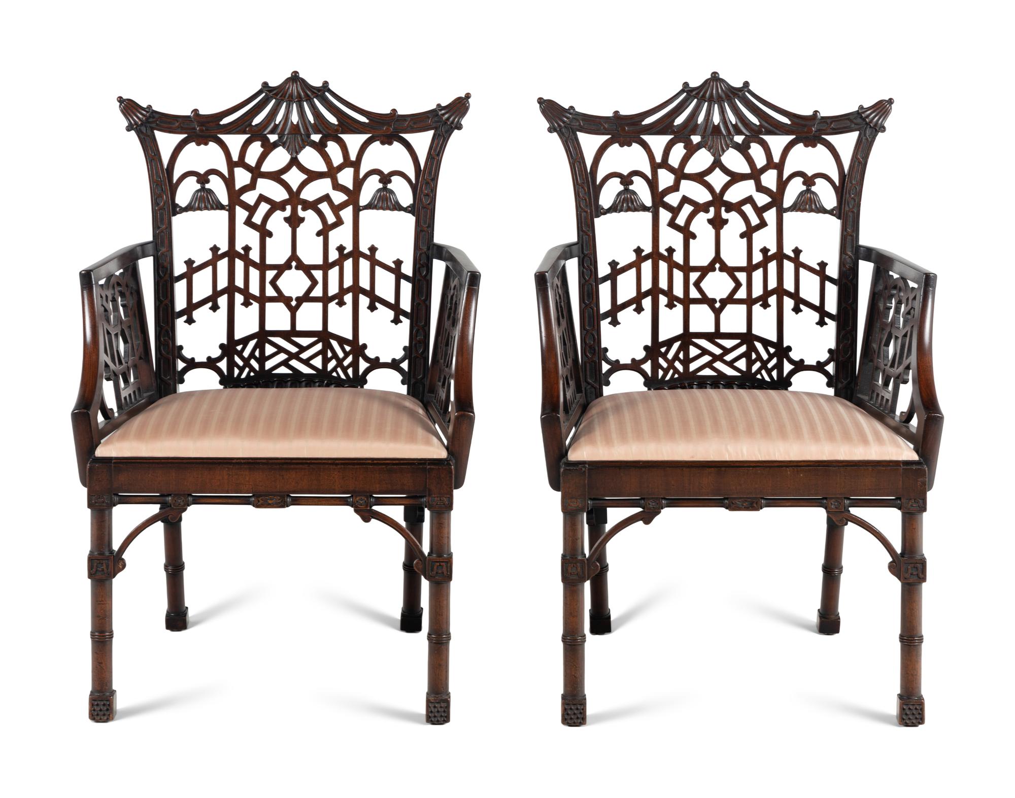 A Pair of George III Style Pierce-Carved Mahogany Armchairs
