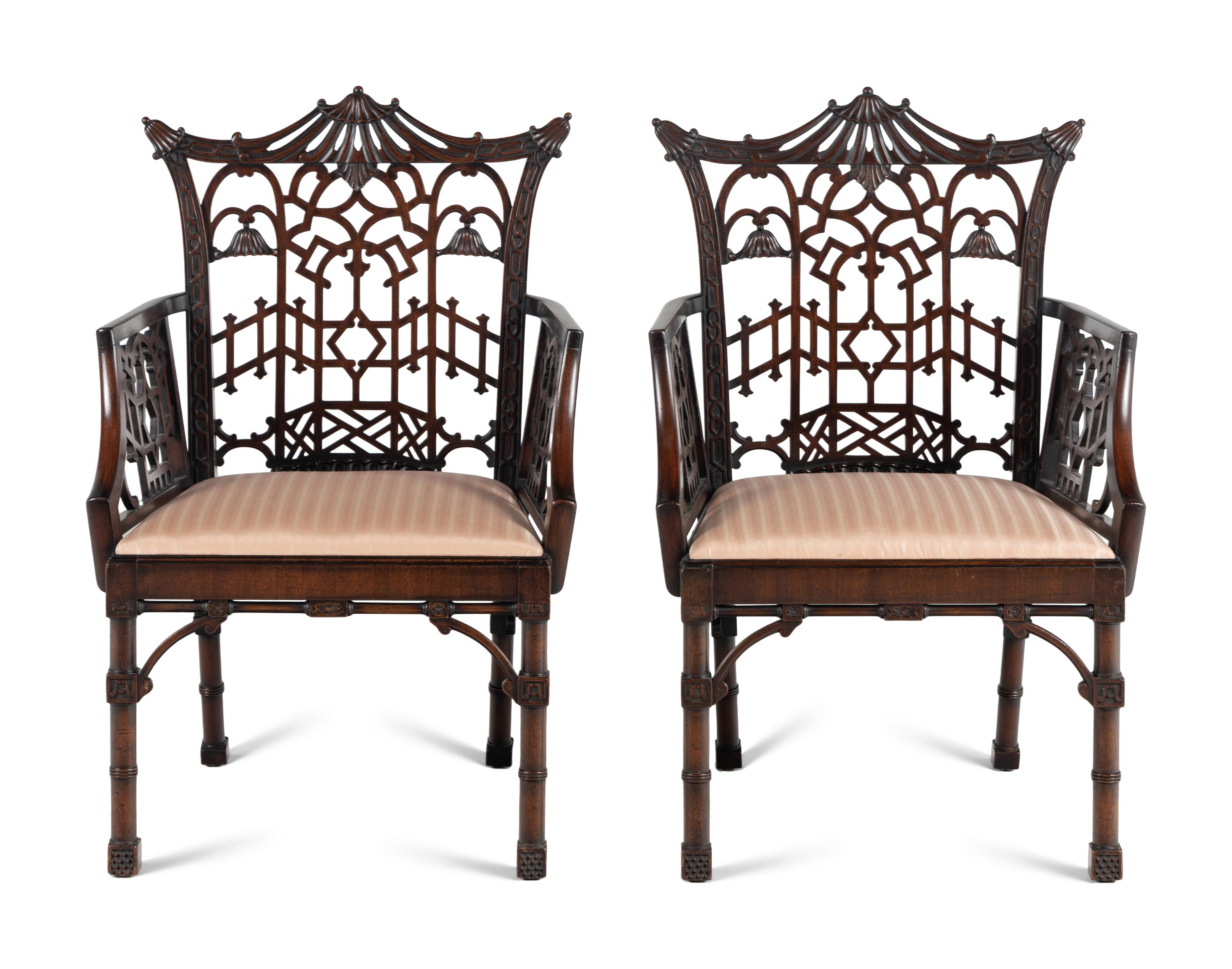 A Pair of George III Style Pierce-Carved Mahogany Armchairs