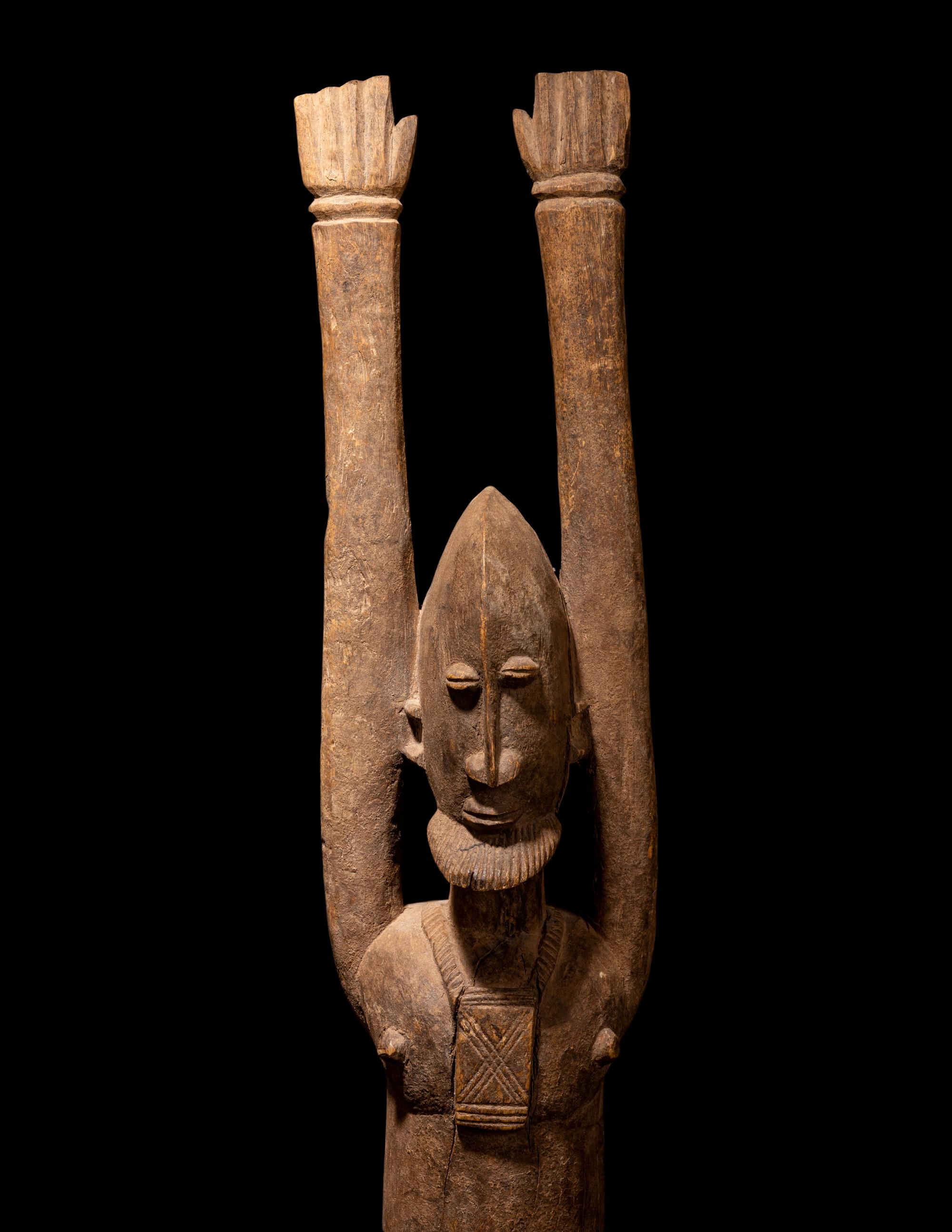 Three Dogan Wood Figures