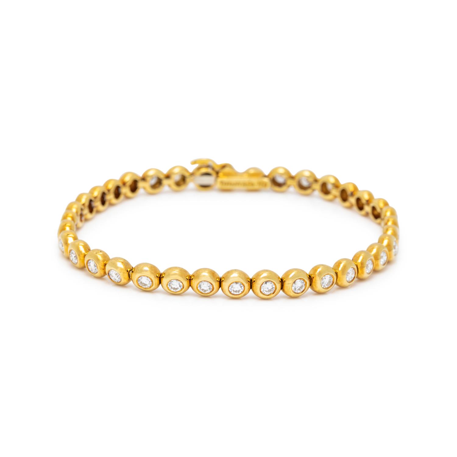 TIFFANY & CO., YELLOW GOLD AND DIAMOND BRACELET