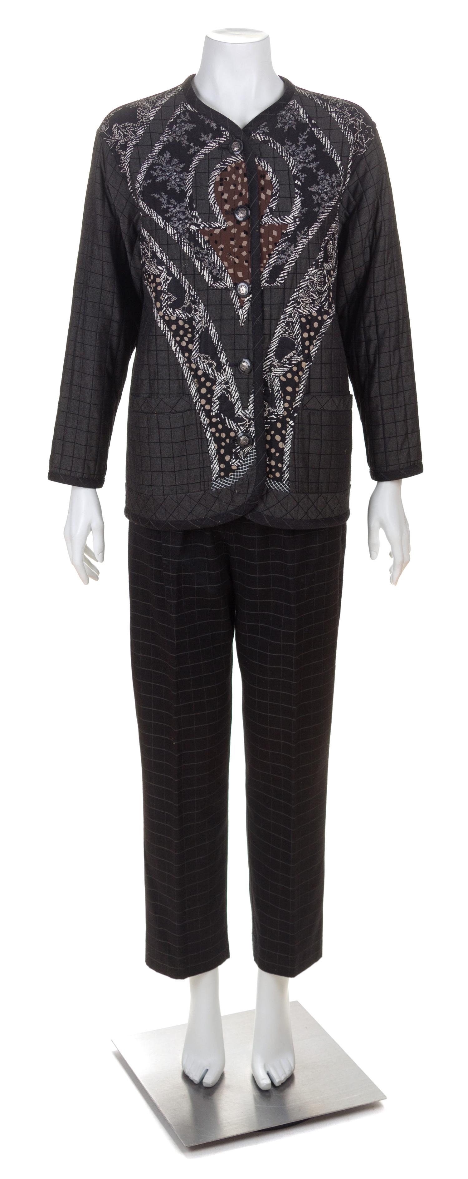 A Koos Black Quilted Reversible Jacket and Pant Suit, Jacket size small.