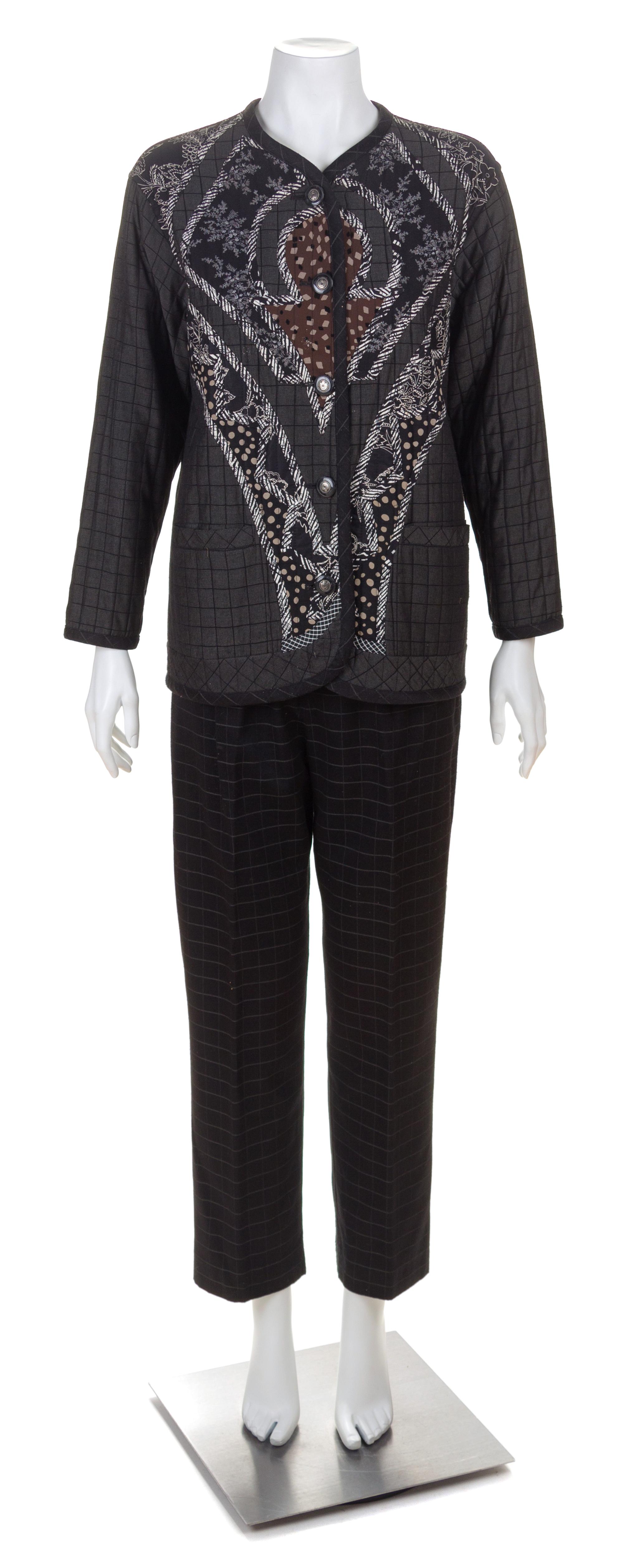 A Koos Black Quilted Reversible Jacket and Pant Suit, Jacket size small.