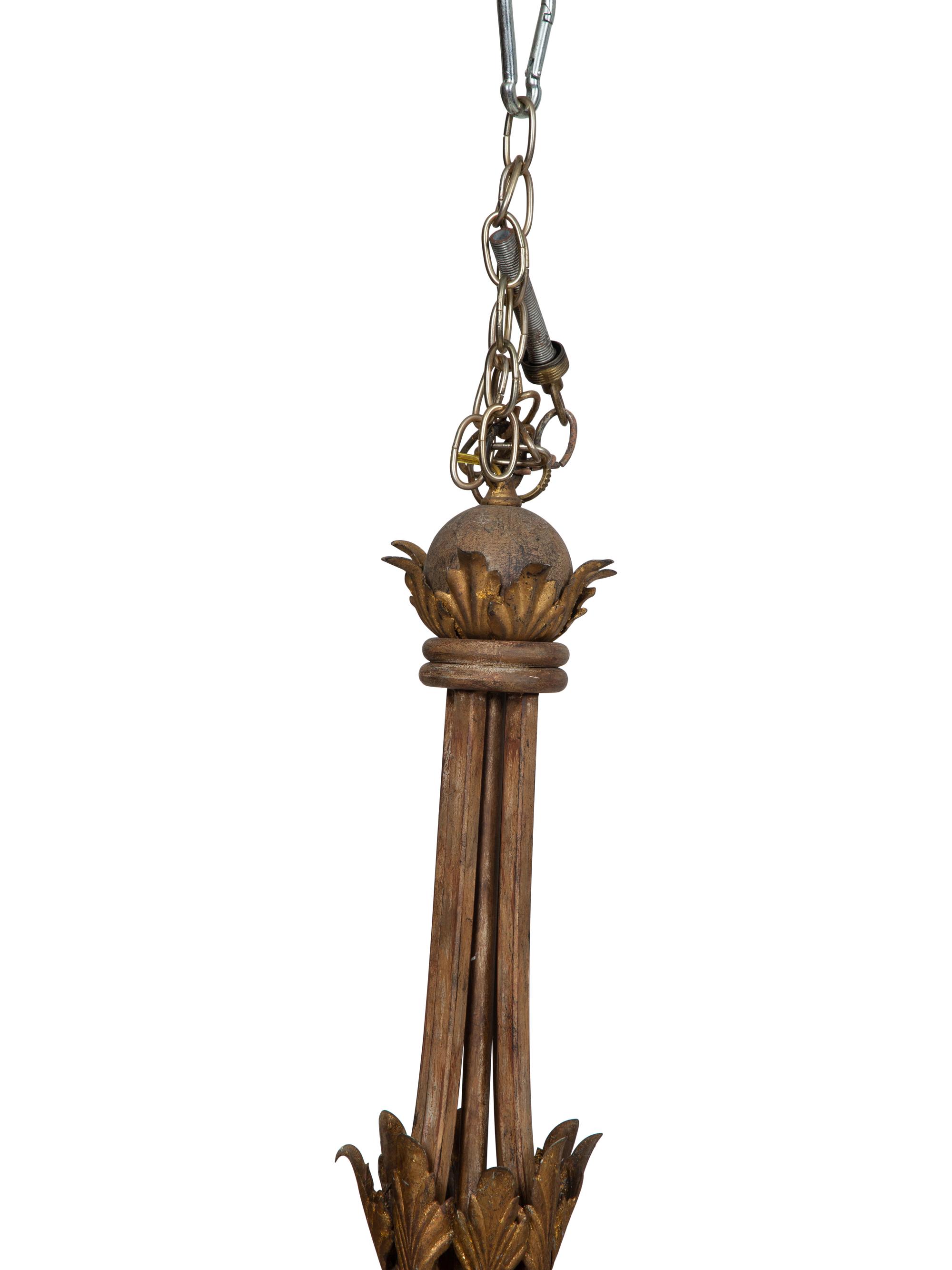 A Venetian Style Gilt Metal Nine-Light Chandelier