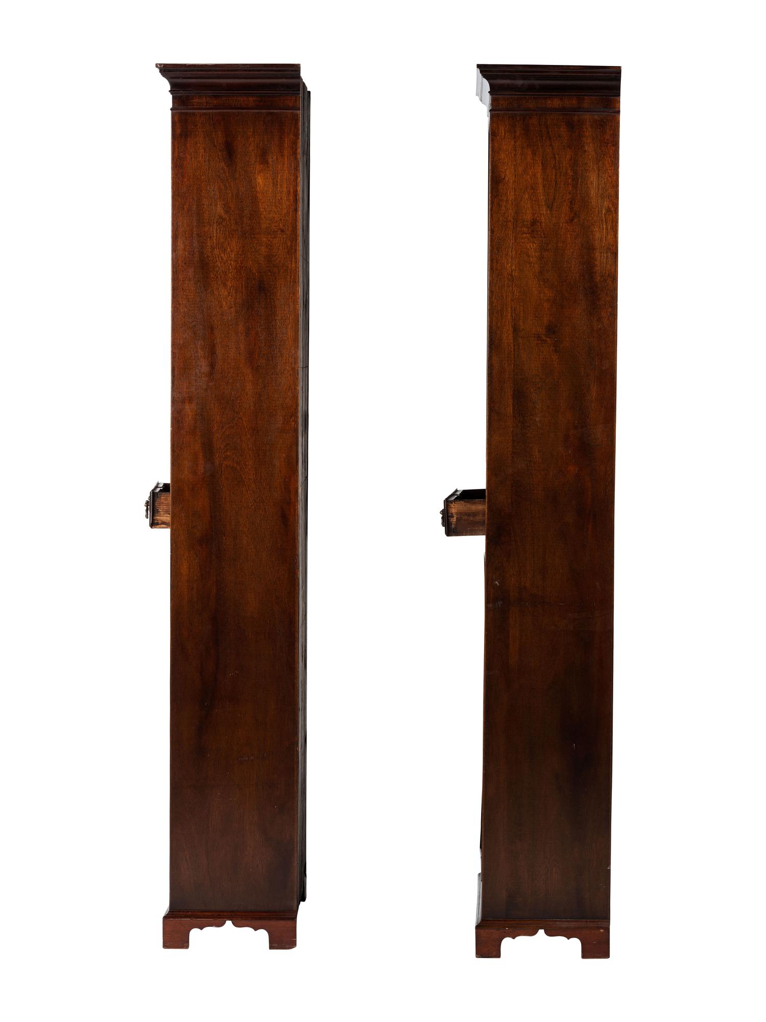 A Pair of George III Mahogany Cabinets