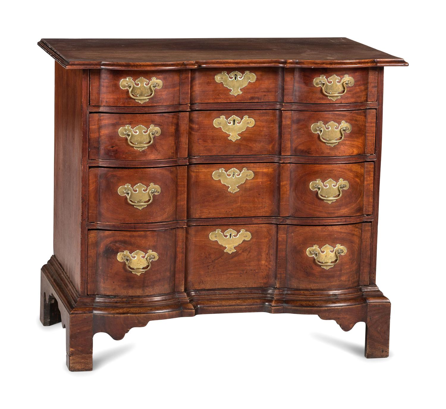 A Chippendale Figured Mahogany Block Front Chest of Drawers