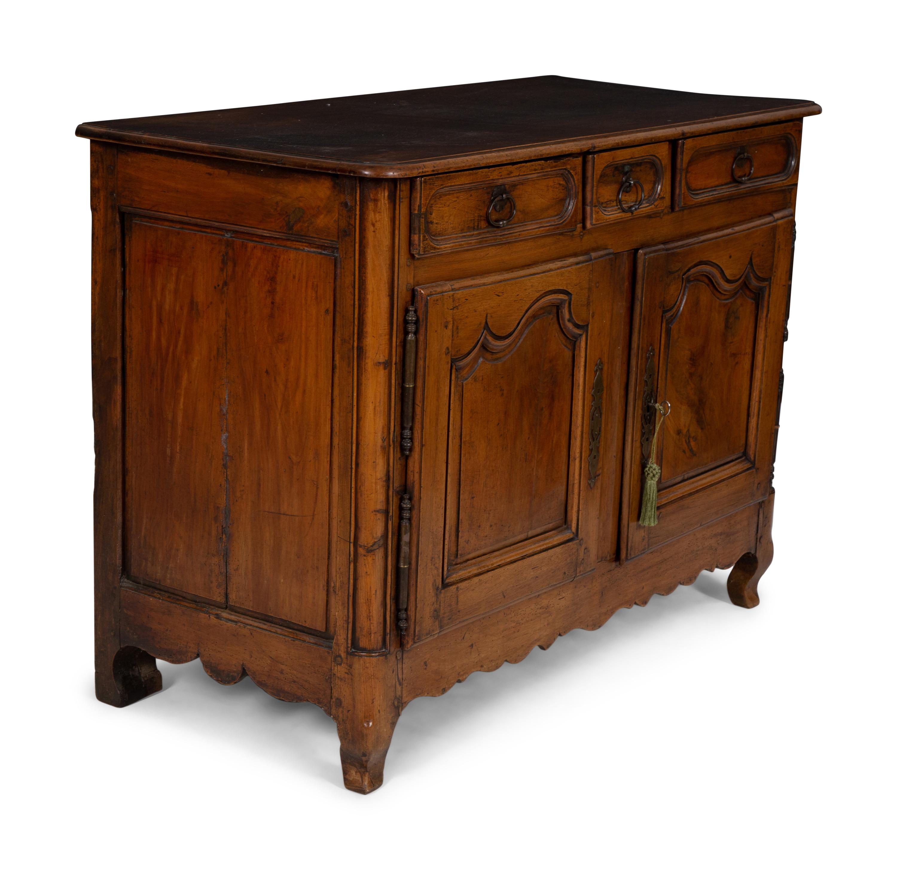 A Louis XV Provincial Walnut Serving Cabinet