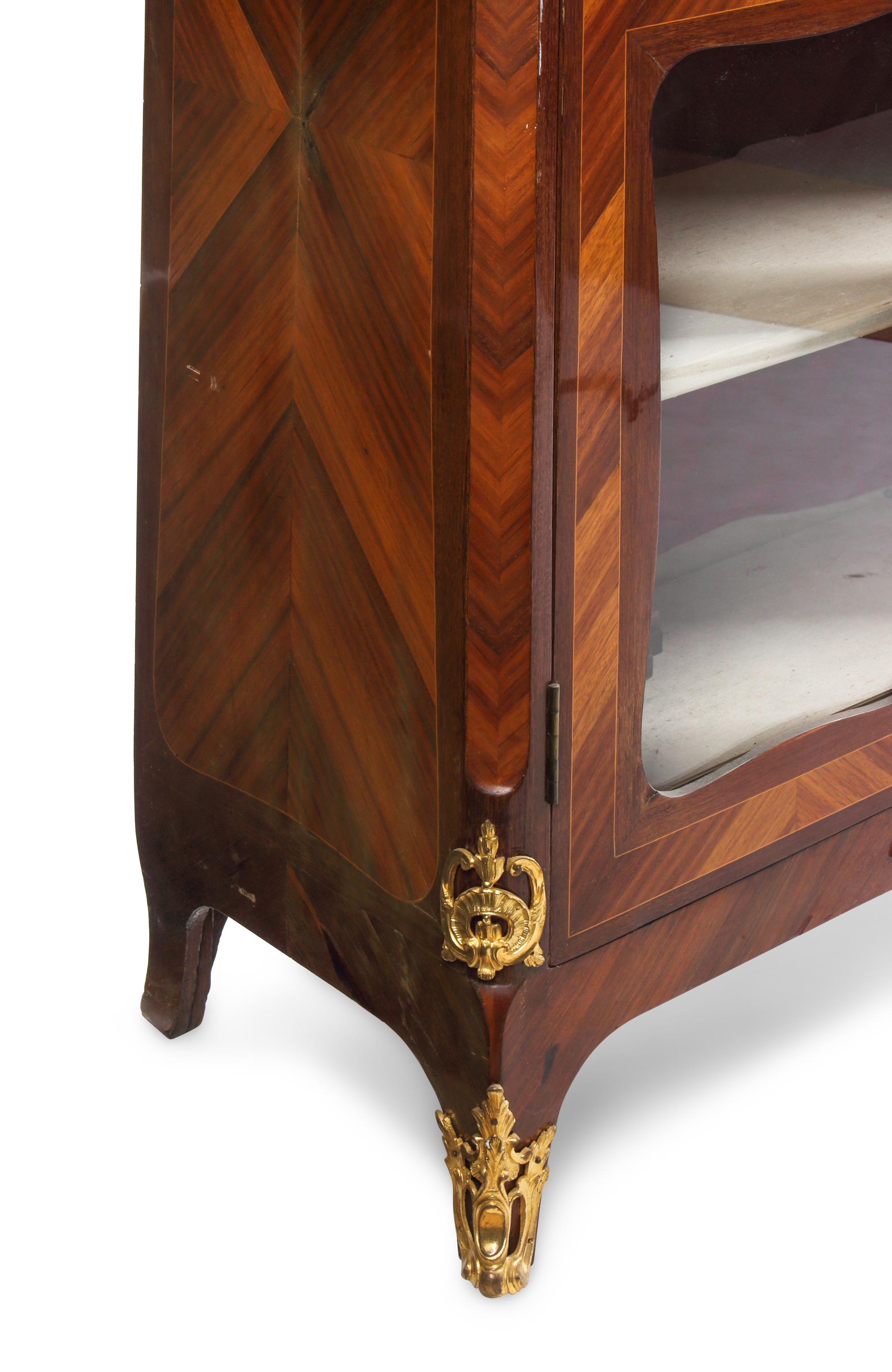 A Louis XV Gilt Bronze Mounted and Bookmatch-Veneer Vitrine Cabinet