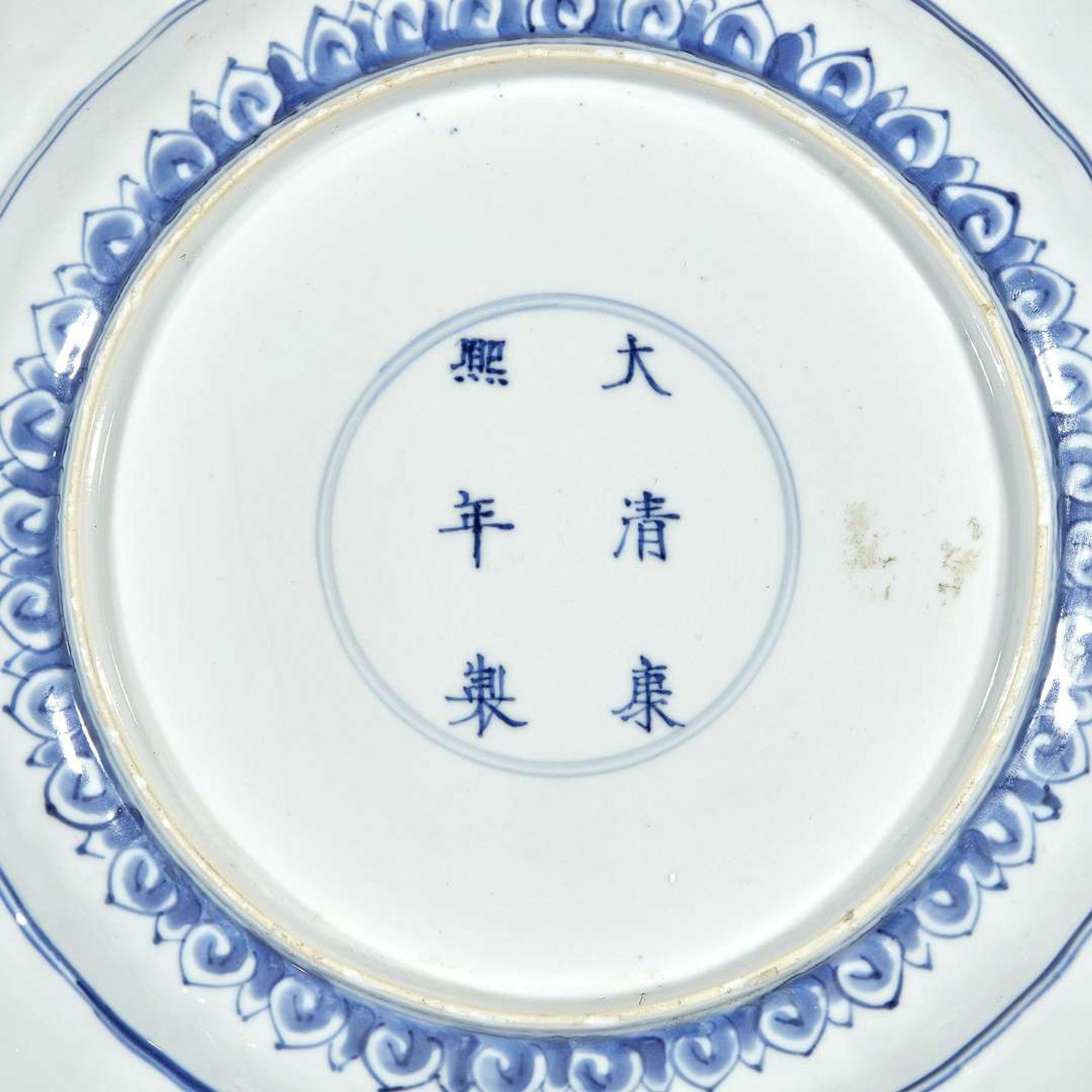 A group of six Chinese blue and white porcelain dishes Kangxi period to early 19th Century