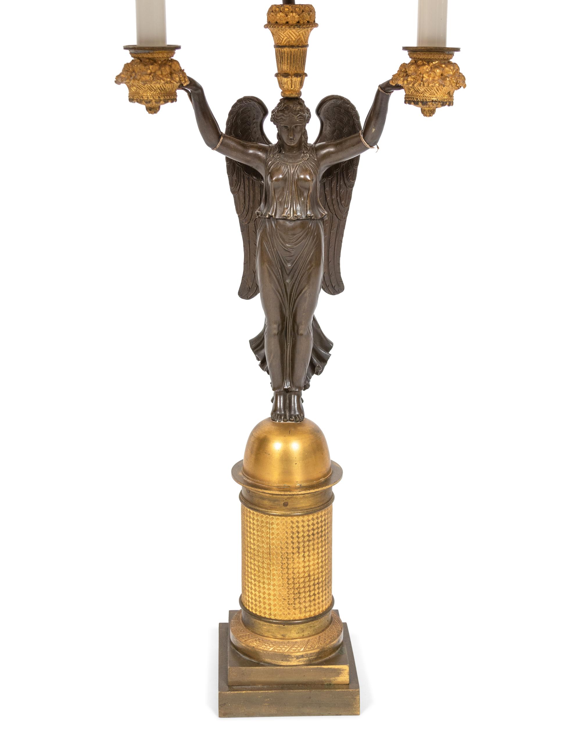 An Empire Style Parcel-Gilt and Patinated Bronze Figural Candelabrum Mounted as a Lamp