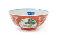 A Ruby-Ground Famille Rose Sgraffiato Porcelain Bowl