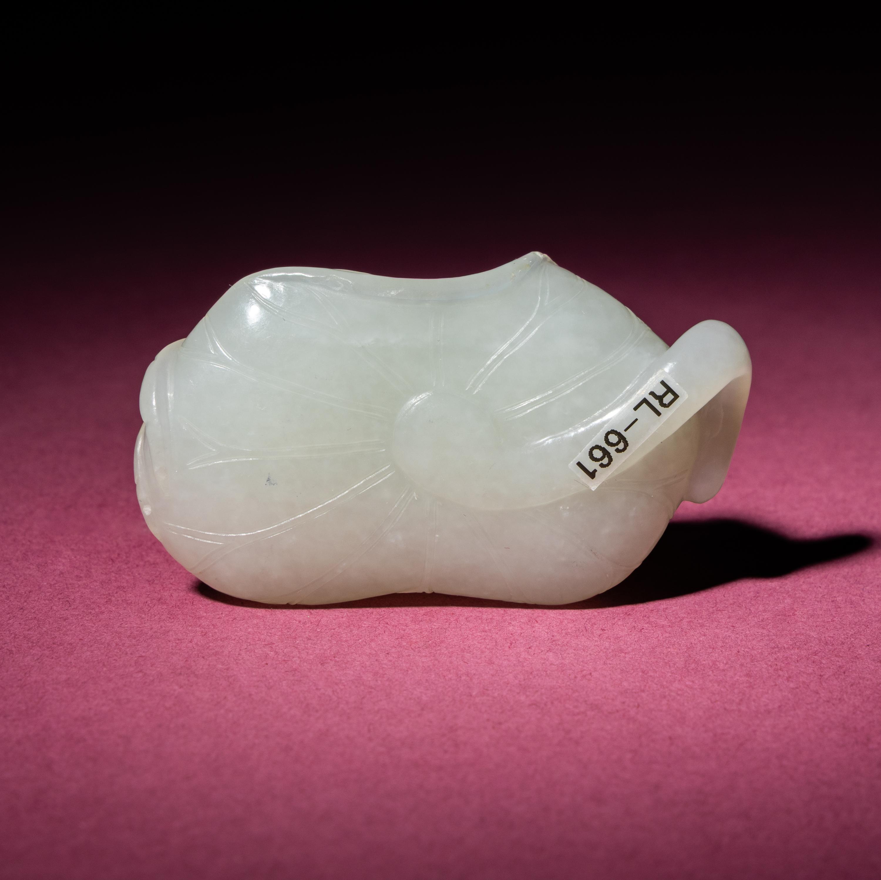 A Chinese White Jade Carving of a Crab on Lotus Leaf, 18th/19th Century — 清中期 白玉蓮葉螃蟹把件
