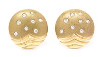 A Pair of 14 Karat Yellow Gold and Diamond Earclips, 8.80 dwts.