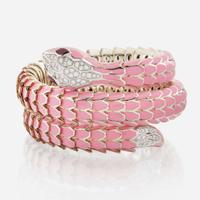 An enamel, white gold plated sterling silver, diamond, and ruby bangle