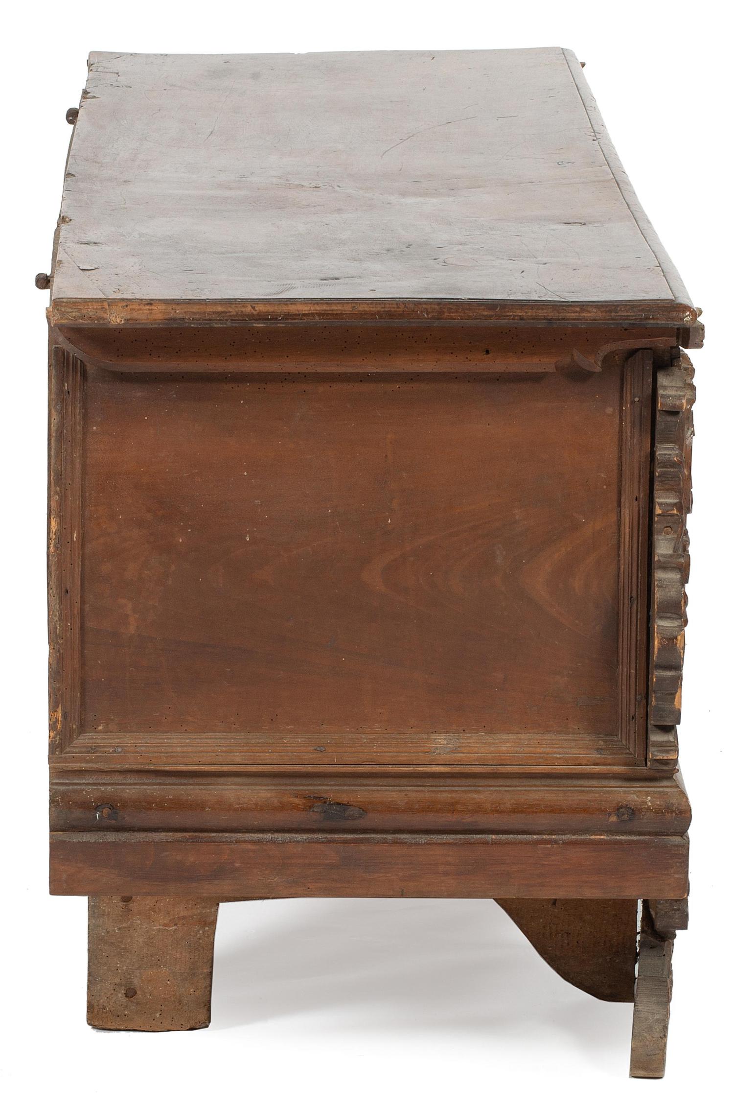 An Italian Carved Walnut Cassone