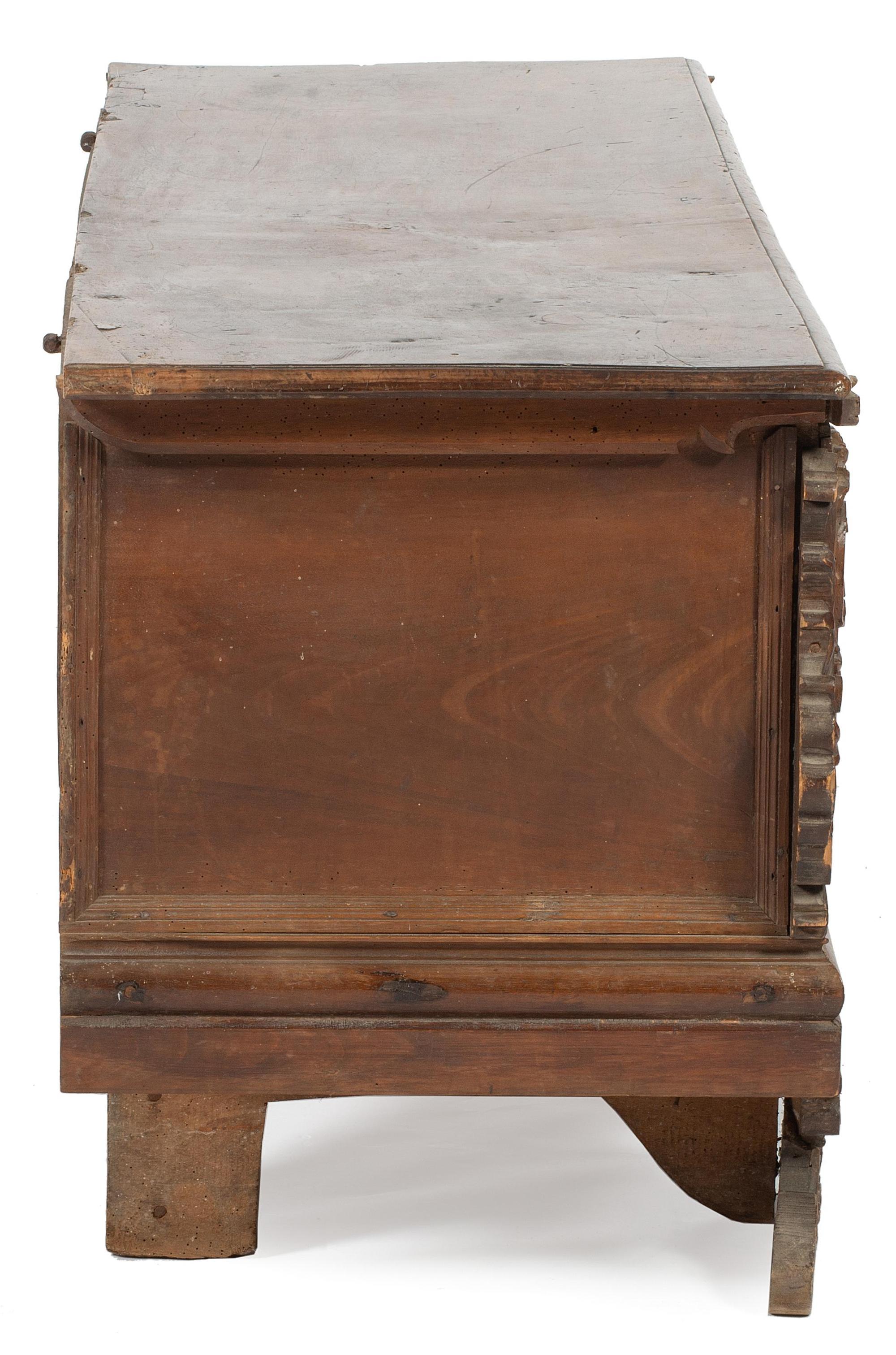 An Italian Carved Walnut Cassone