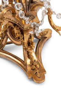 A Pair of French Gilt Bronze, Cut Glass and Rock Crystal Three-Light Candelabra