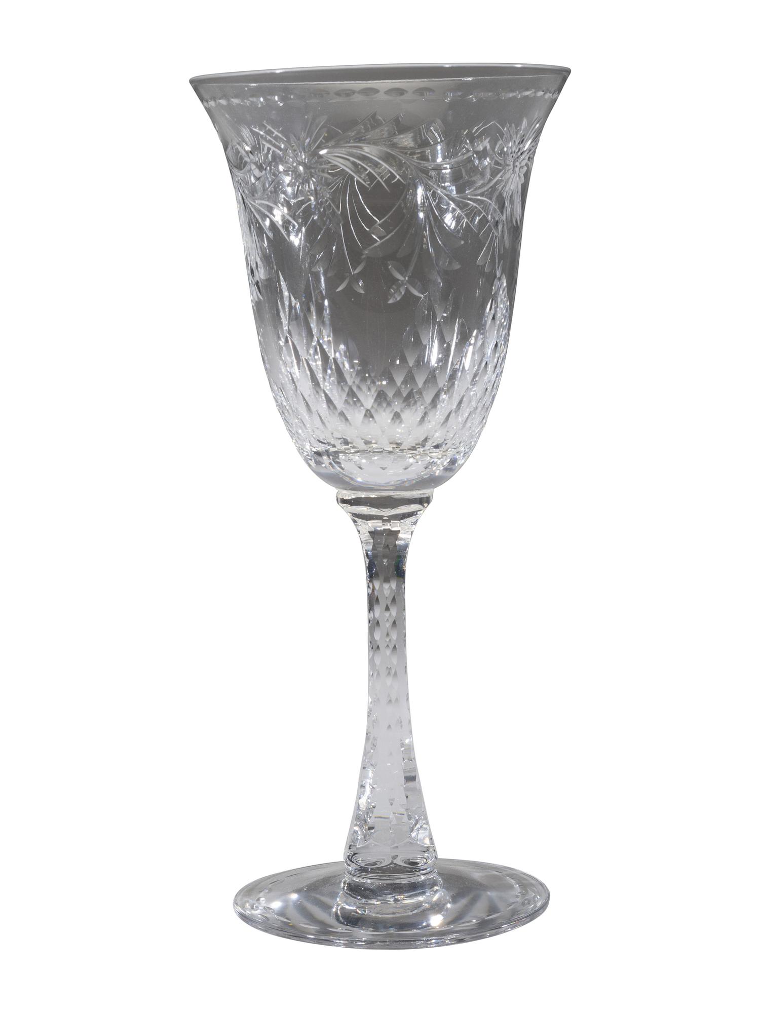 A Collection of Cut Glass Stemware and Plates