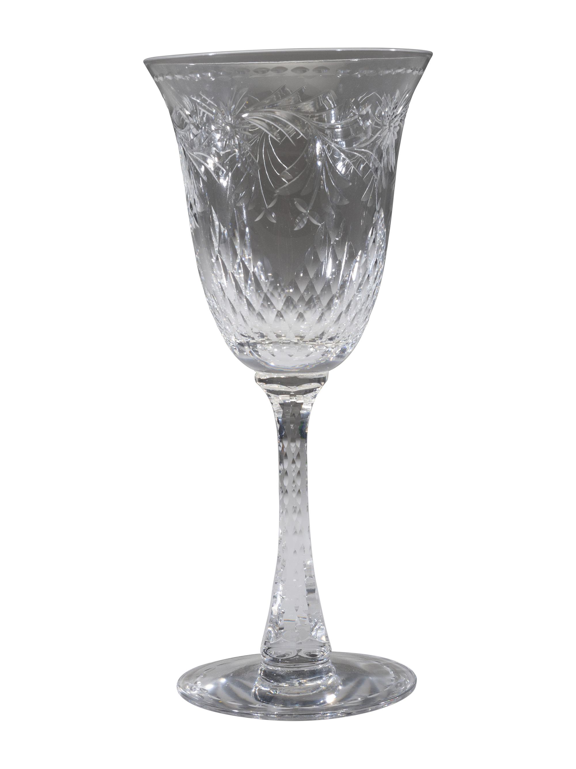 A Collection of Cut Glass Stemware and Plates