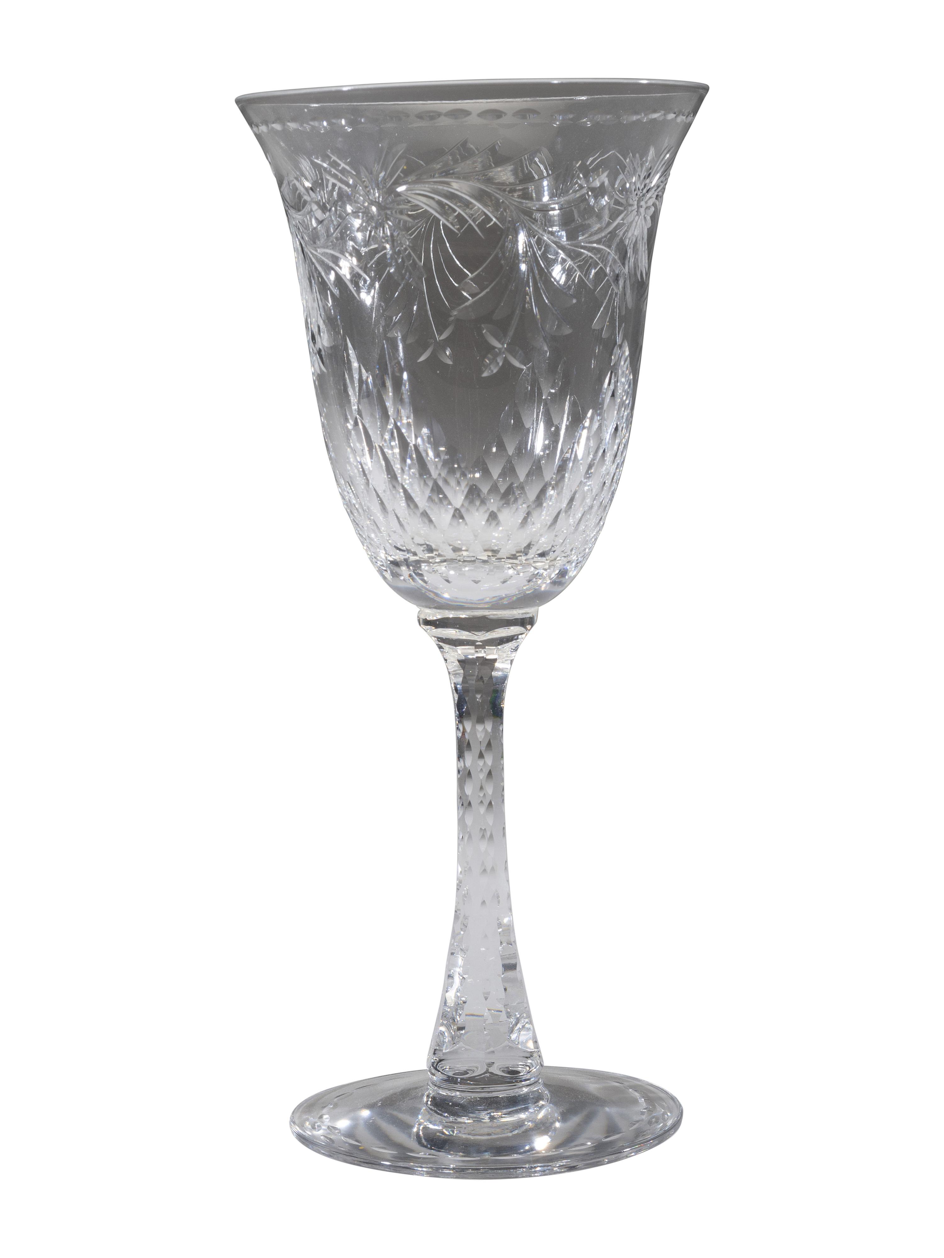 A Collection of Cut Glass Stemware and Plates