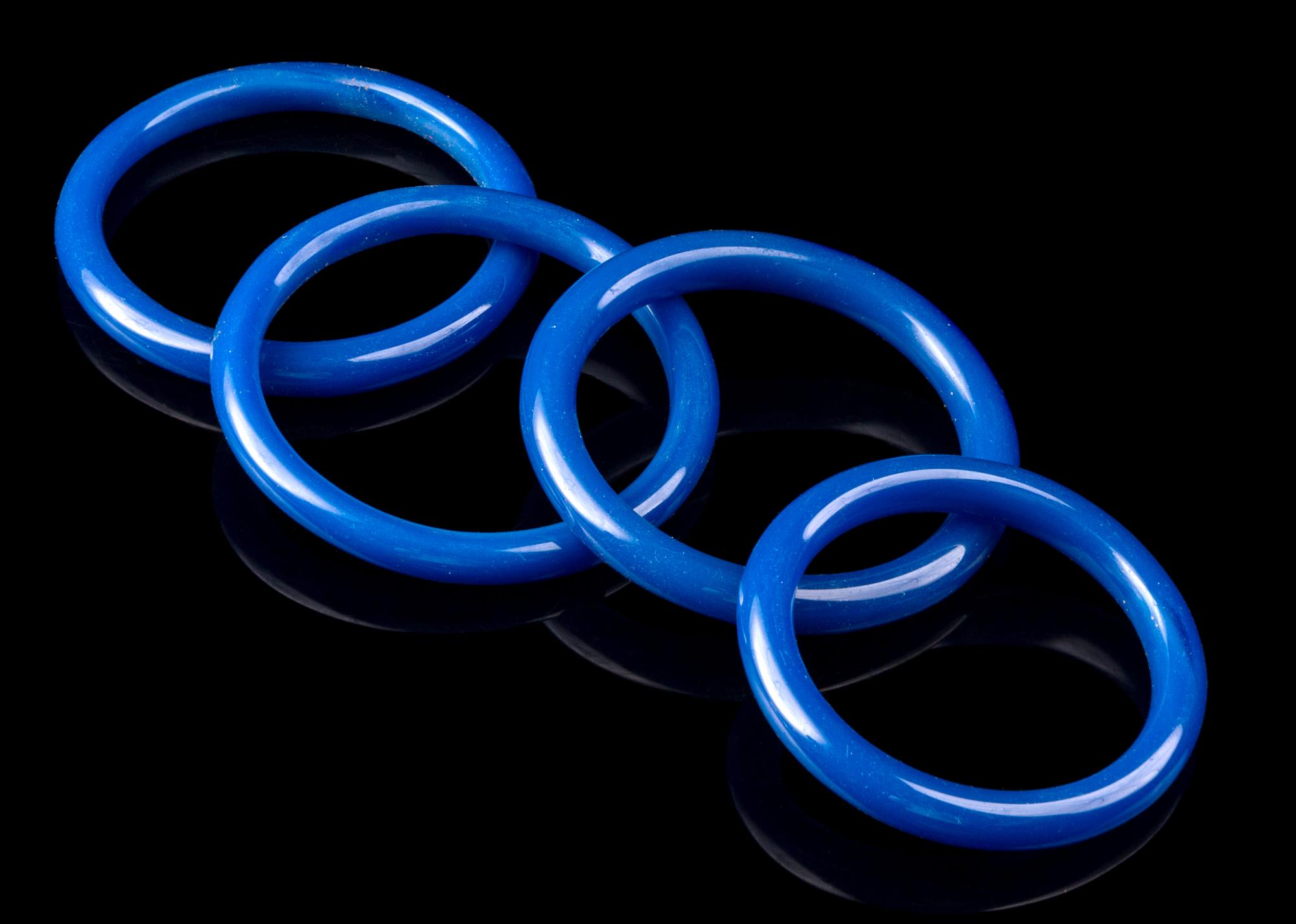 Four Chinese Blue Peking Glass Bangles