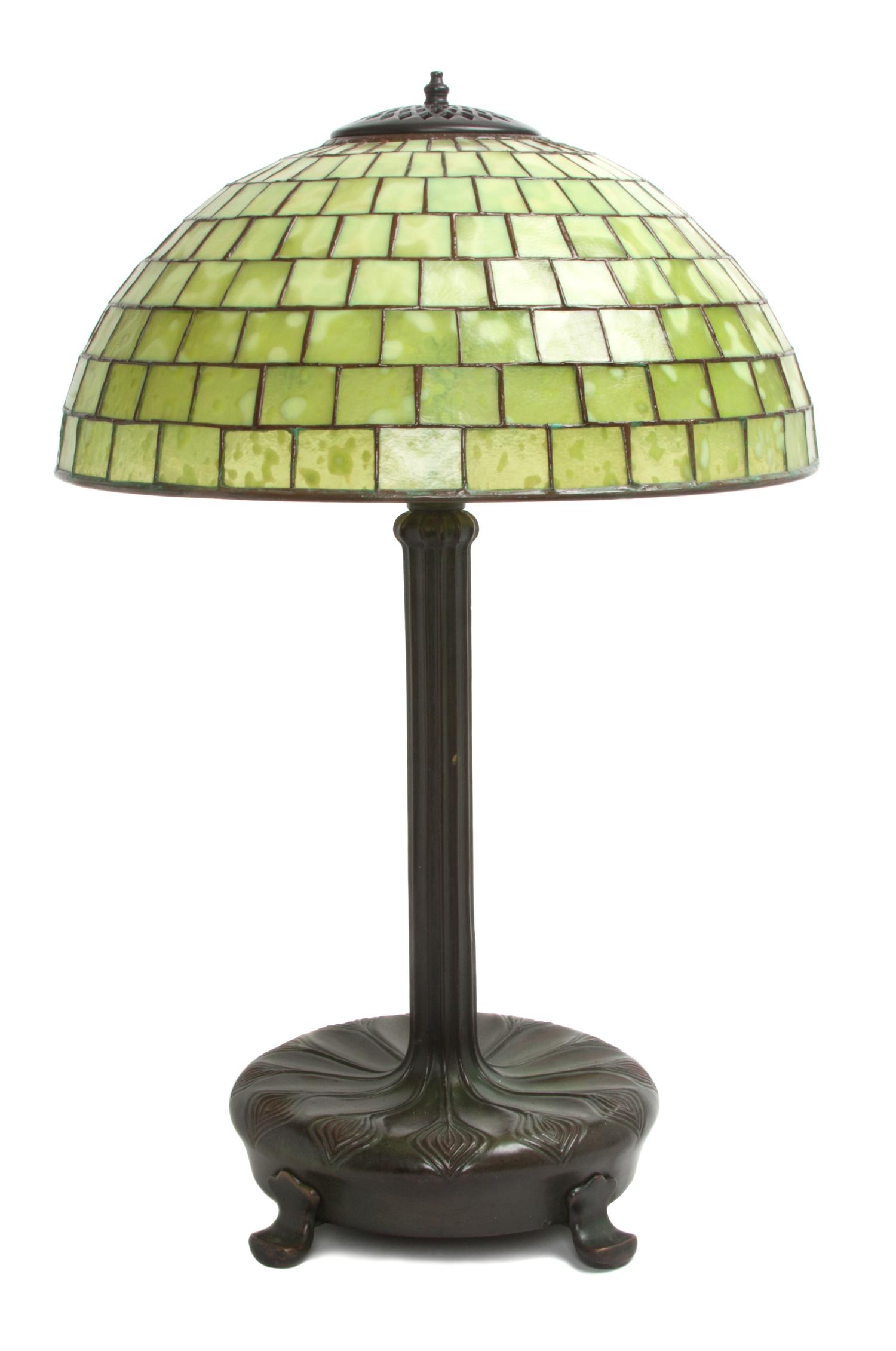 An American Leaded Glass Lamp Diameter of shade 16 x height overall 23 1/2 inches. — 2ND HALF 20TH CENTURY