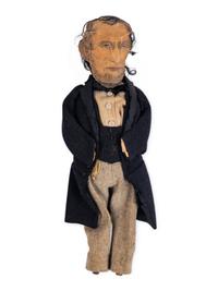 [LINCOLN-JOHNSON CAMPAIGN]. A folk art doll of Abraham Lincoln in long frock coat, ca. 1864.