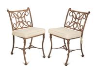 A Pair of Patinated Metal Garden Chairs and Side Table