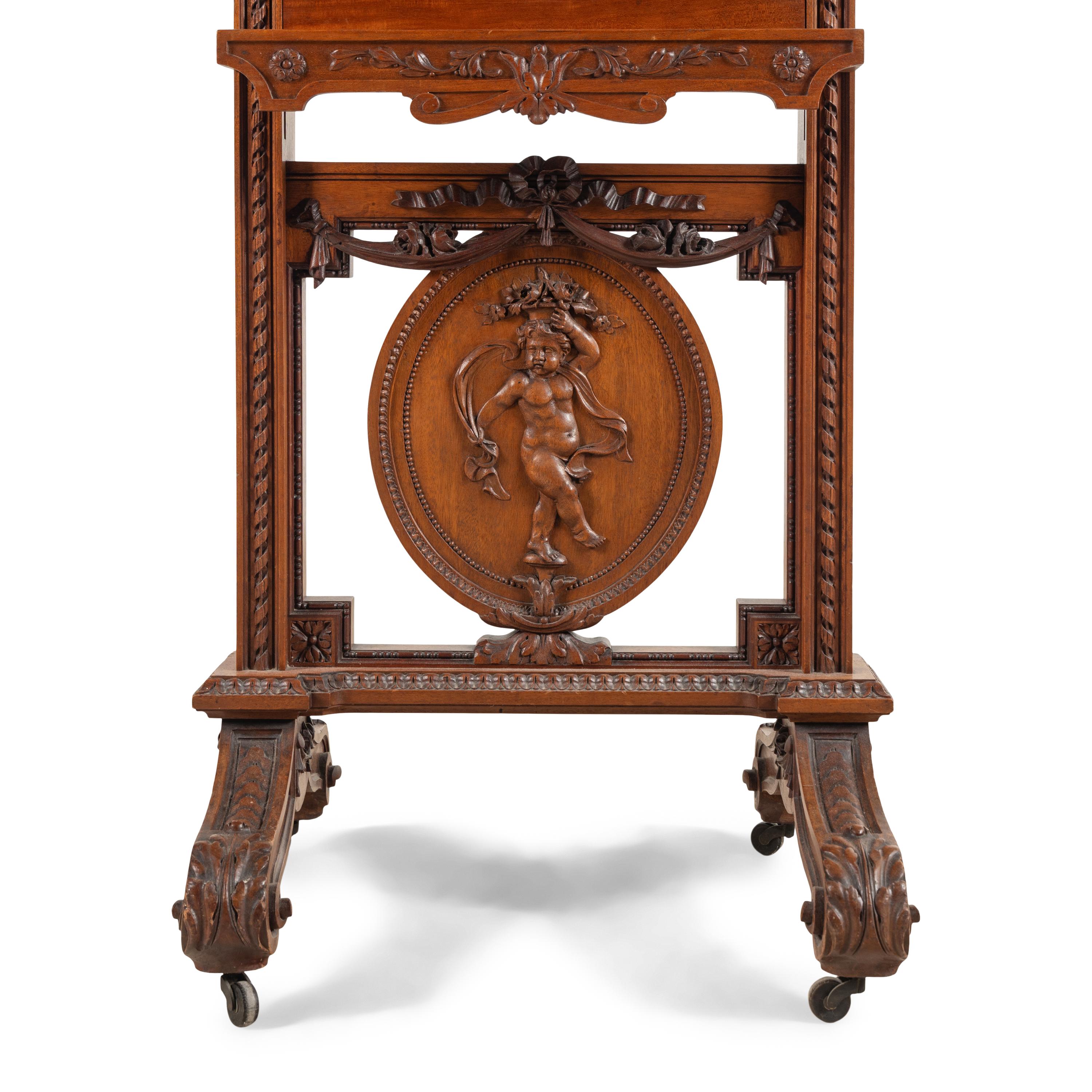 A French Neoclassical Carved Walnut Easel