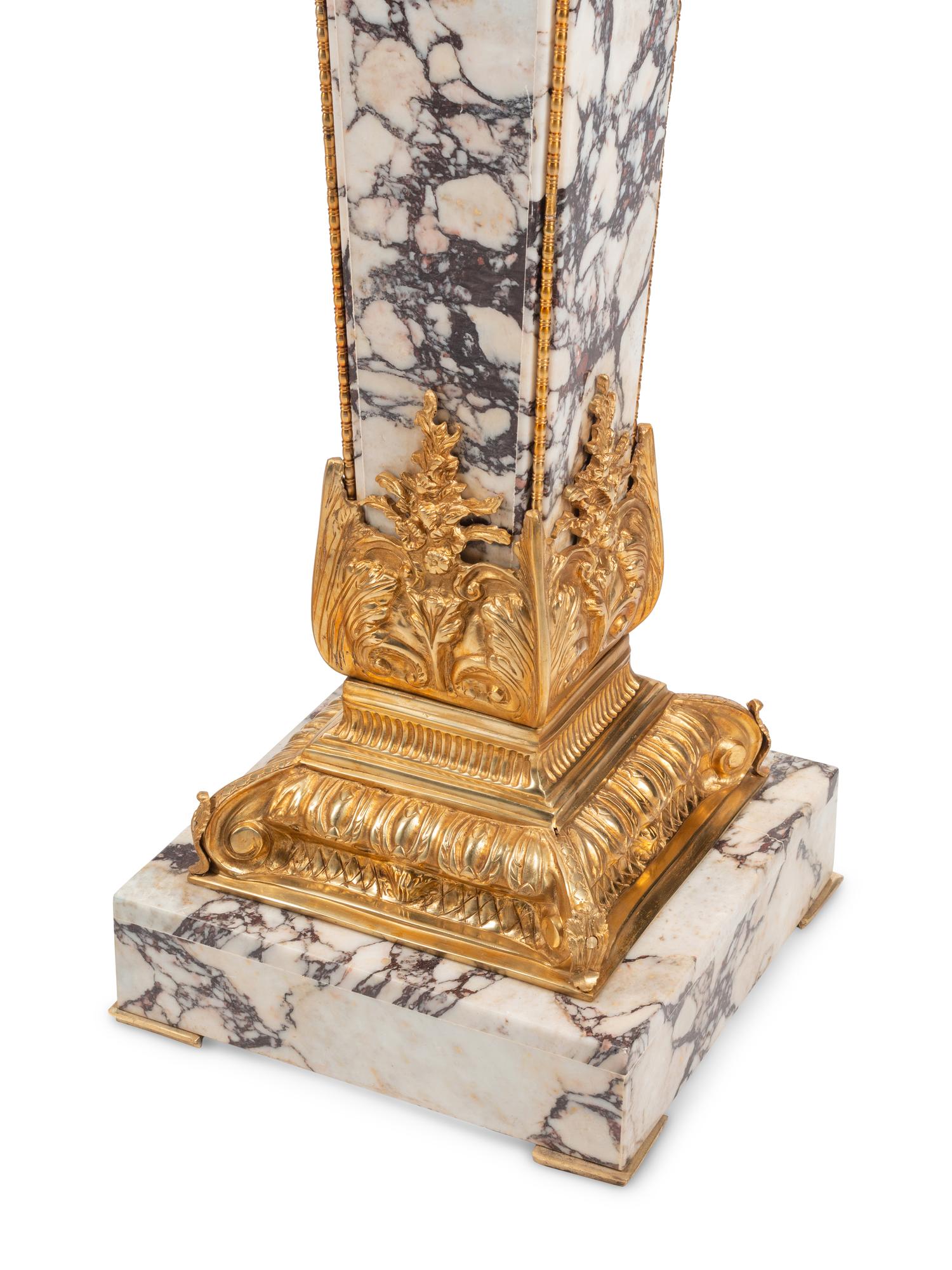 A Pair of Louis XVI Style Gilt Bronze Mounted Marble Pedestals