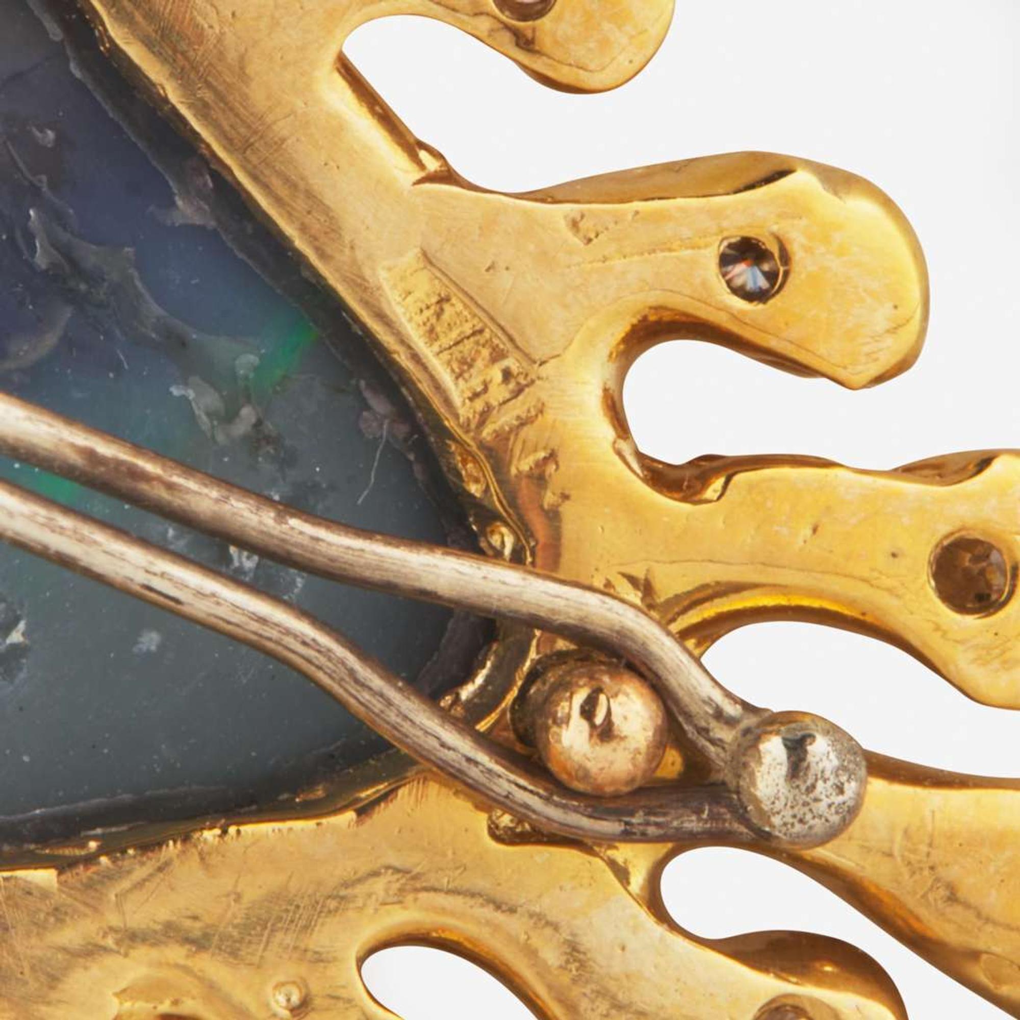 A Yellow Gold and Black Opal Pendant