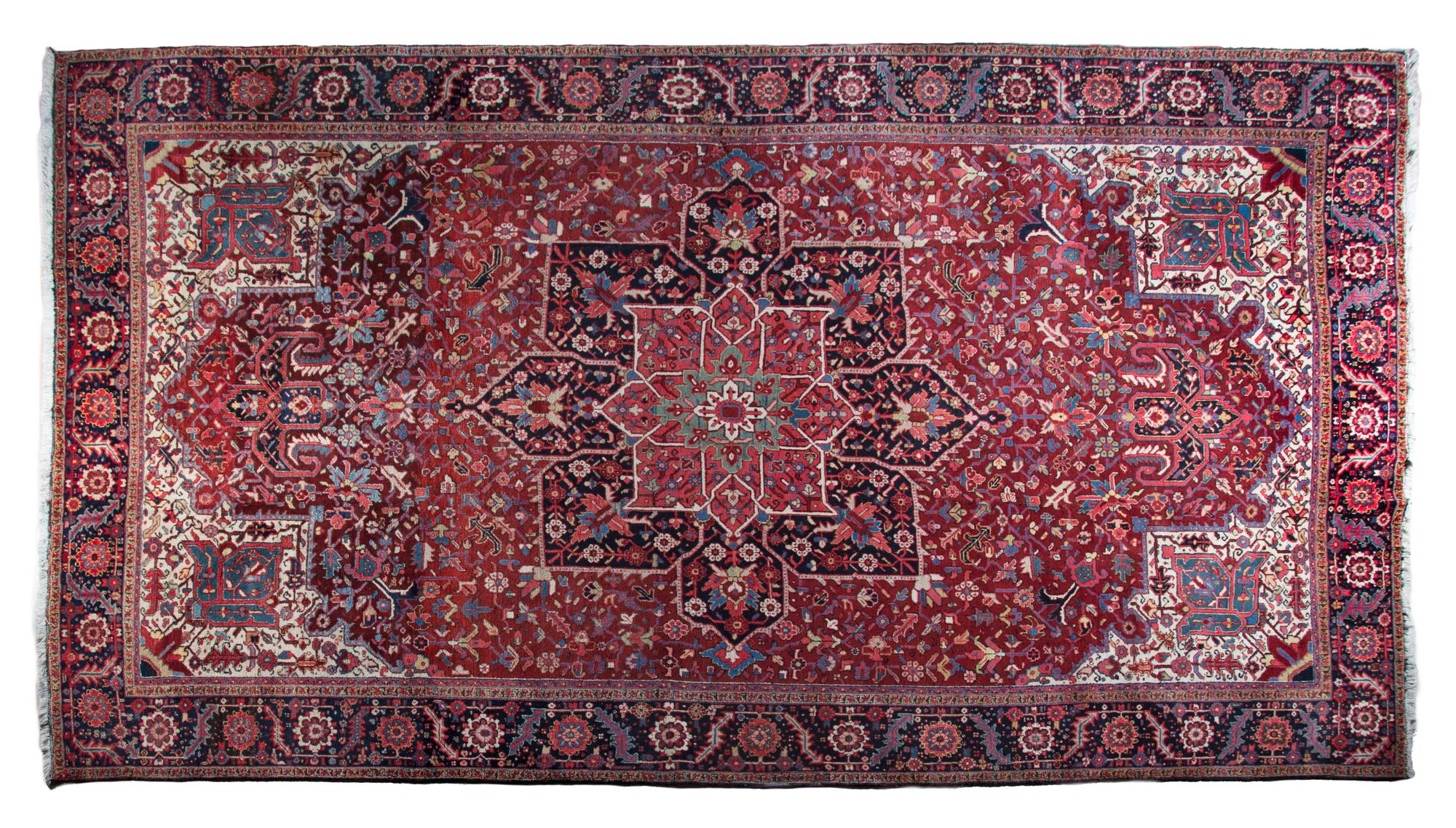 A Heriz Wool Rug 17 feet 4 inches x 11 feet 5 inches. — FIRST HALF 20TH CENTURY
