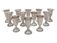 A Group of 12 American Silver Cordials