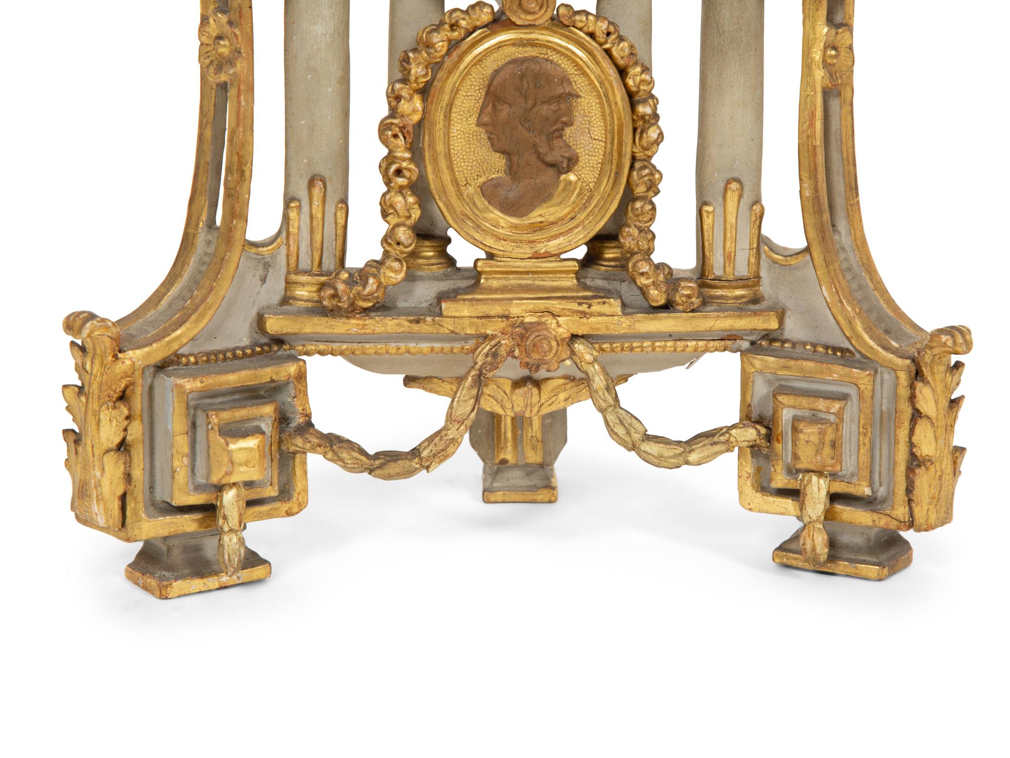 A Louis XVI Painted and Parcel Gilt Carved Wood Watch Stand