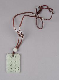 A Celadon Jade Rectangular Plaque, Height 2 inches.